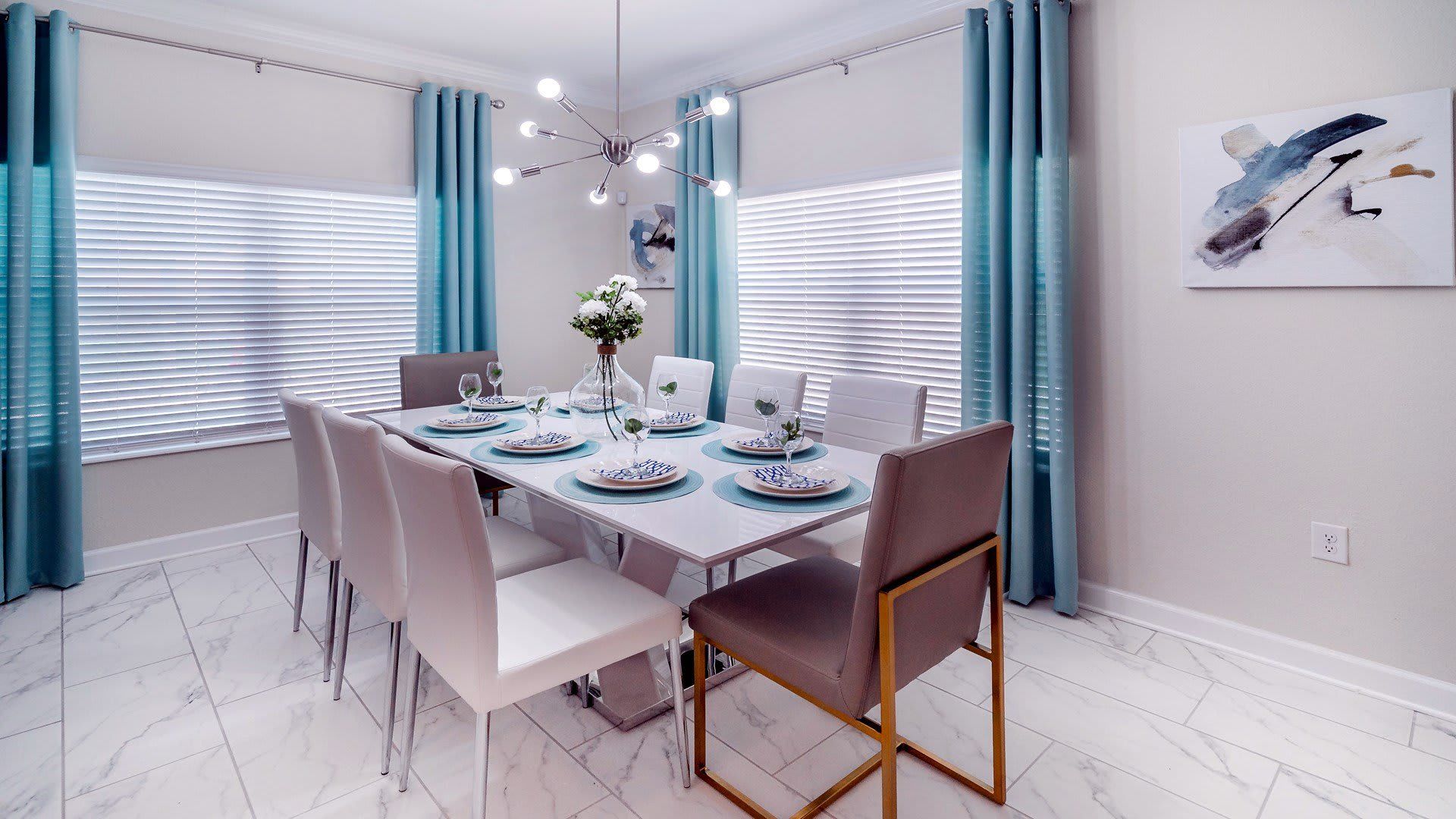 Expansive dining room accommodates a large table with seating for eight, perfect for gatherings