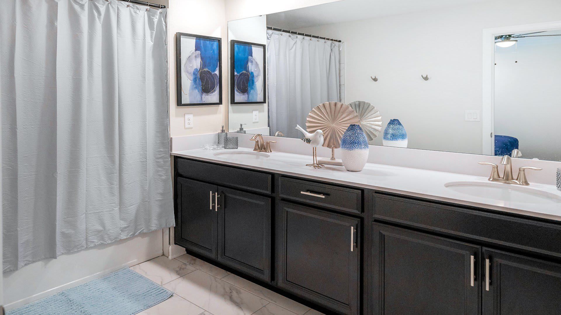 Ample counter space in the upstairs bathroom, providing convenience and room for personal items