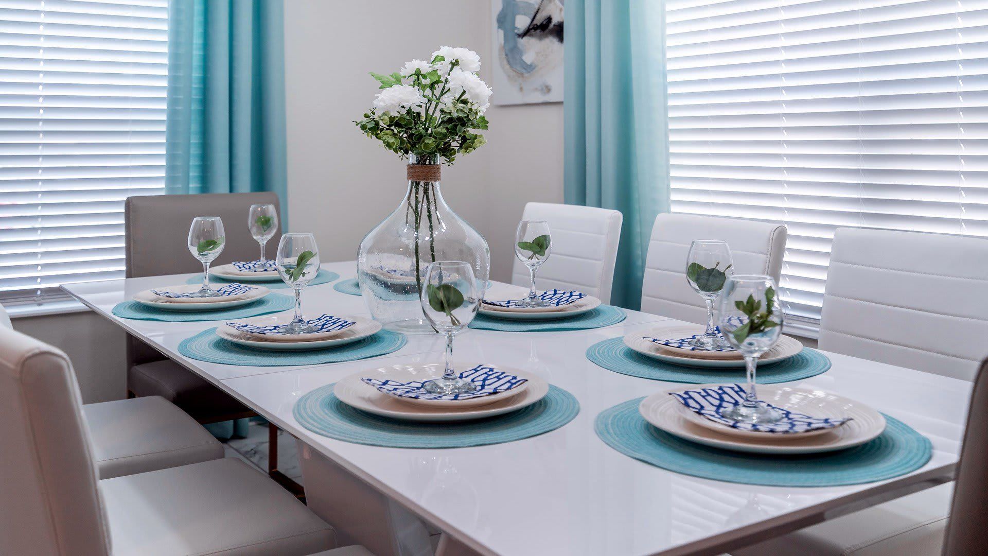 Expansive dining room accommodates a large table with seating for eight, perfect for gatherings