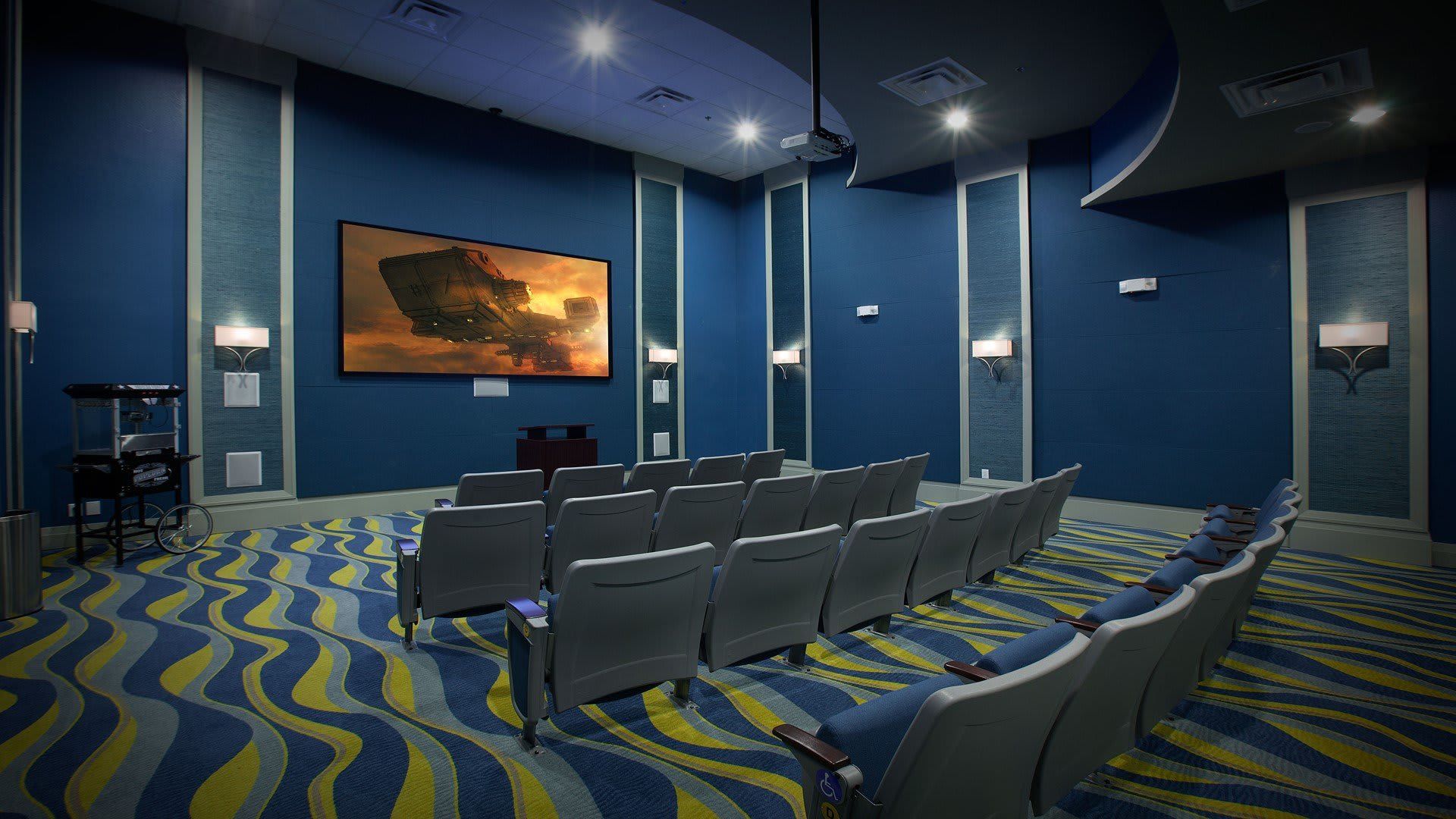 Resort Amenities - Resort theater room, featuring plush seating and top-notch audiovisual facilities.