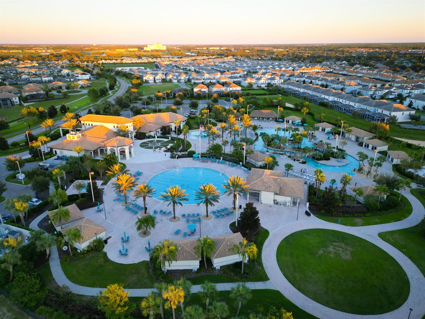 Resort Overview -Resort overview featuring pools adorned with palm trees, creating a tropical oasis for ultimate relaxation