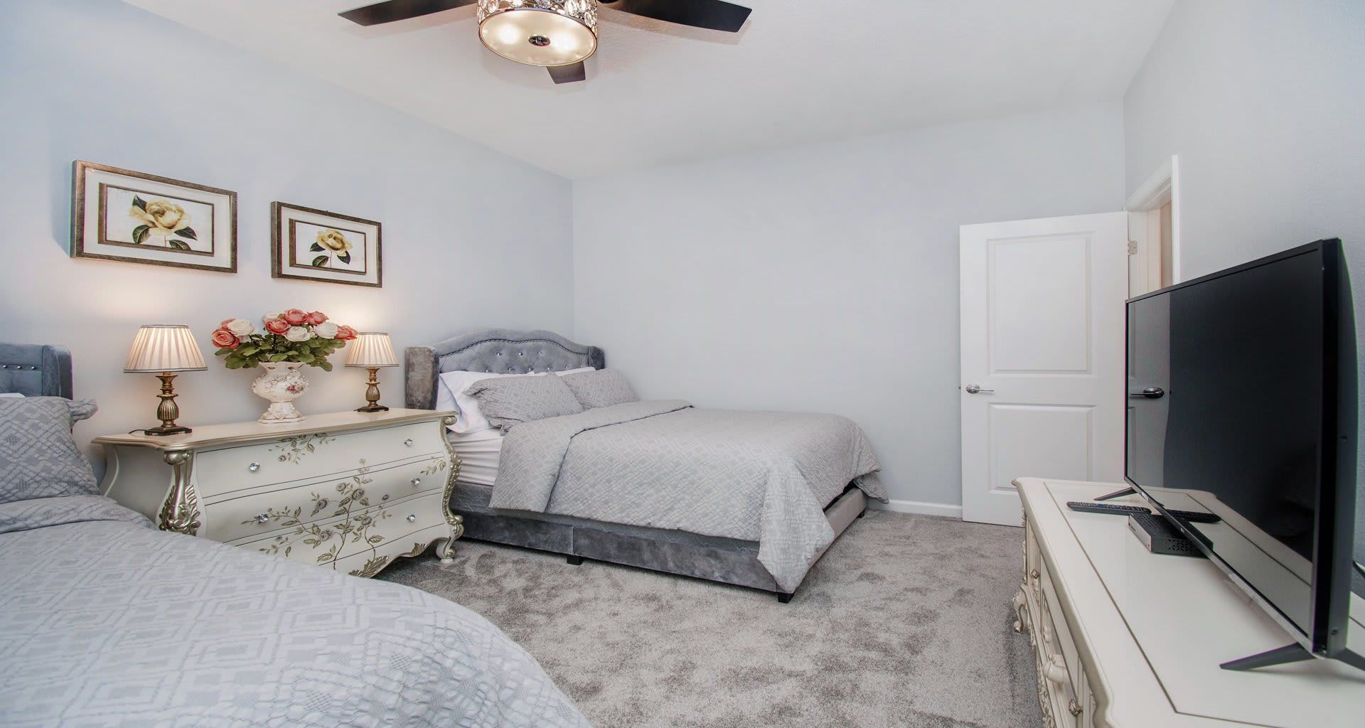Generous second bedroom with two comfortable full beds, providing ample space for a cozy stay