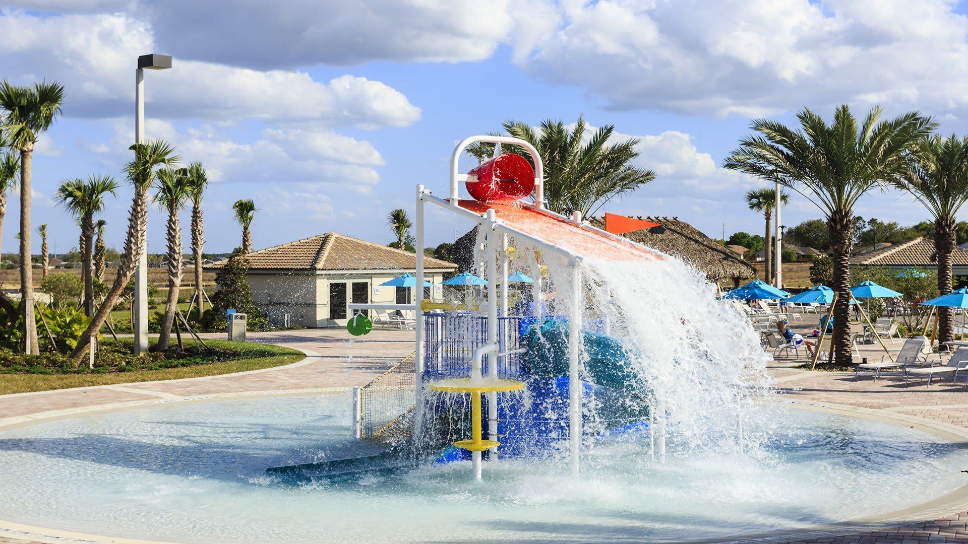 Resort Amenities - Adorable kiddie splash pool, offering a safe and playful water experience for the little ones to enjoy