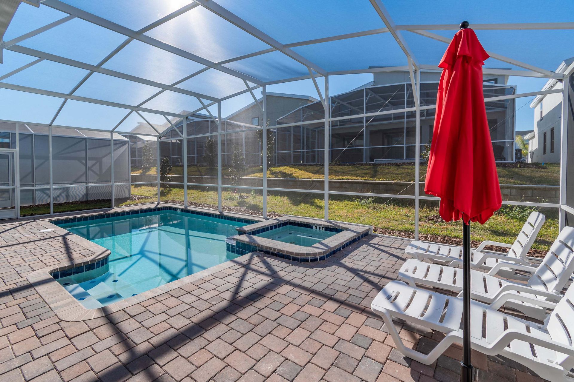 Relax in your private screened pool & spa with sunny seating!