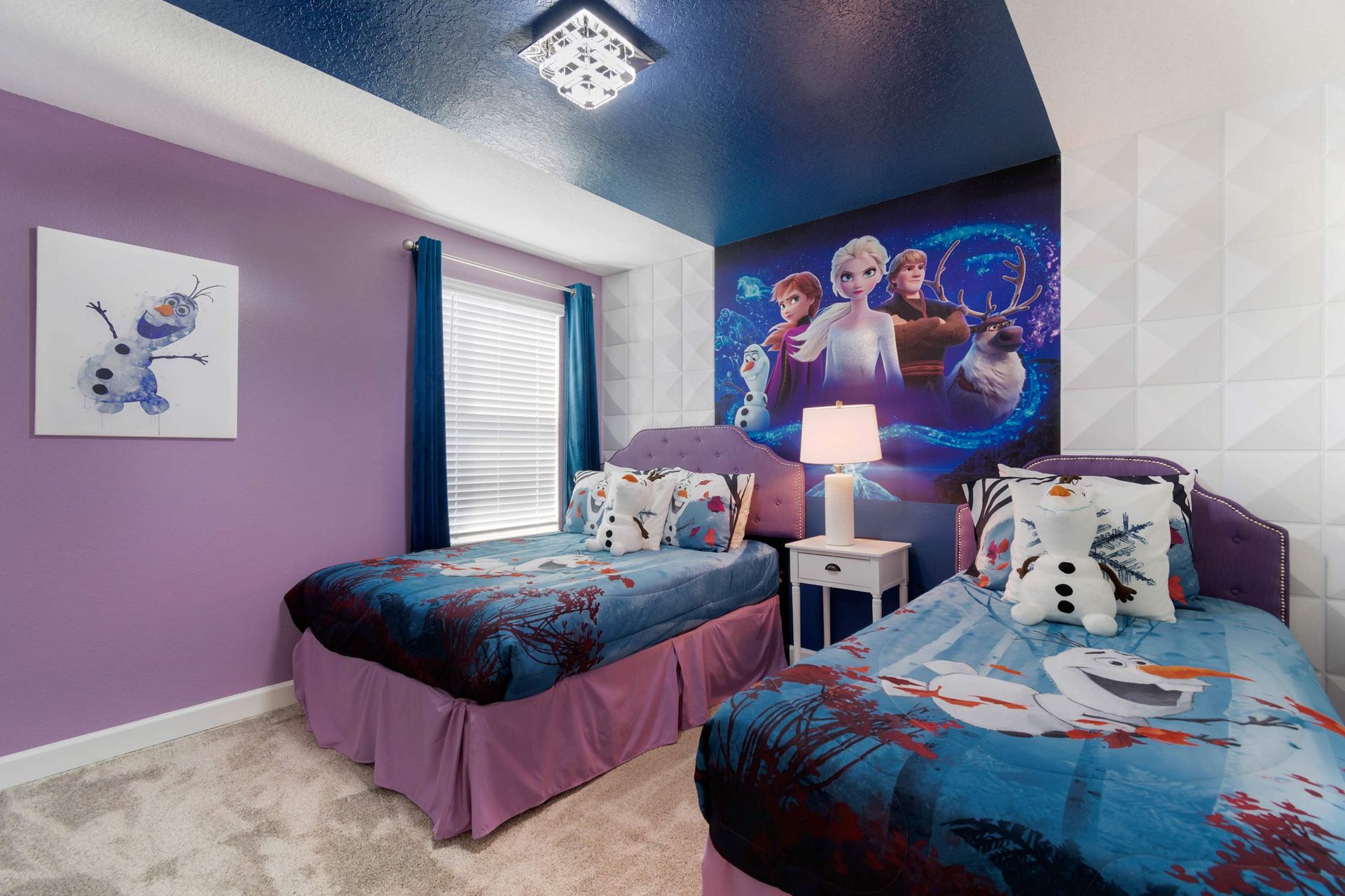 Whimsical Frozen-themed bedroom w/ twin beds & Olaf accents!