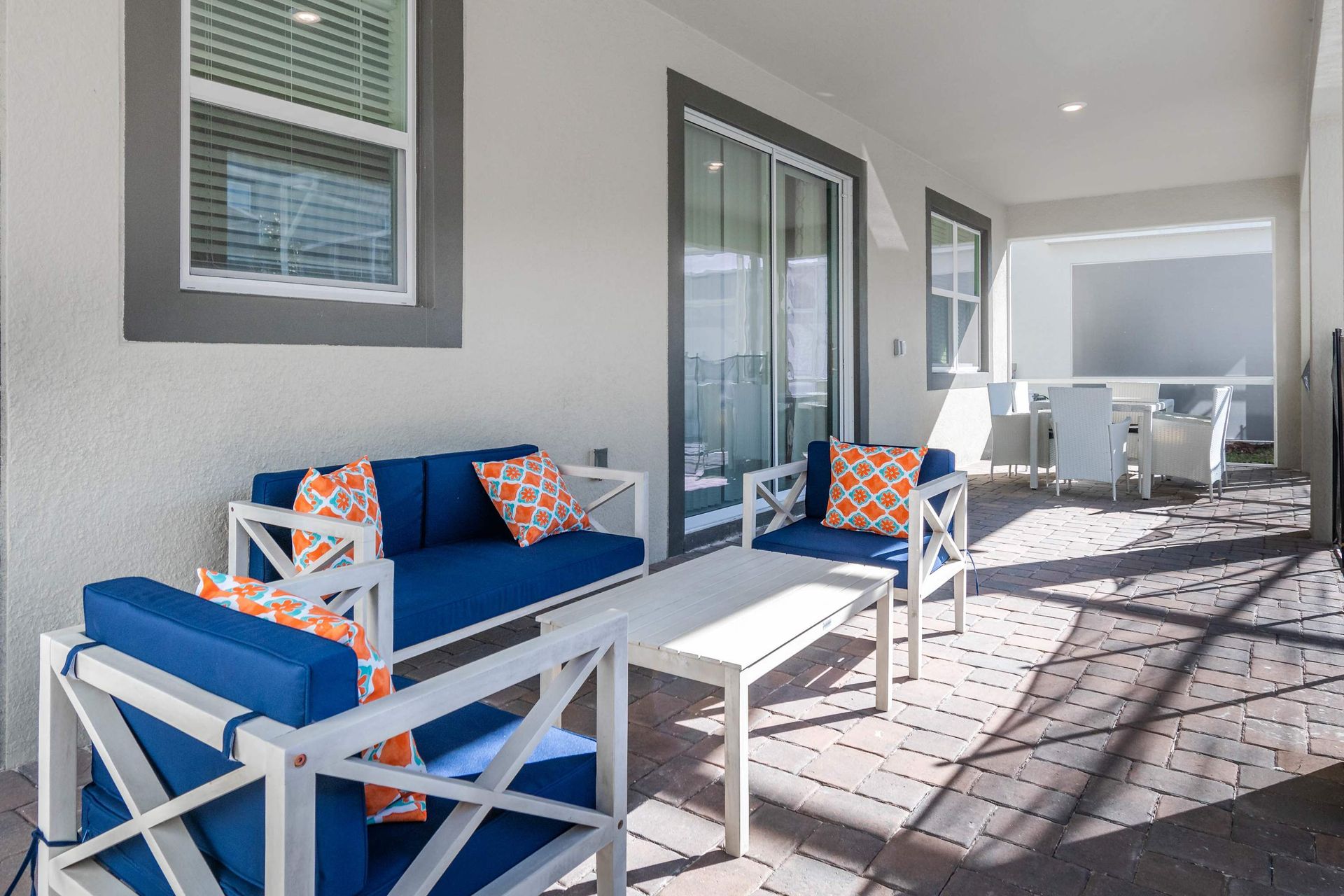 Chic outdoor lounge & dining area—perfect for relaxing or dining!