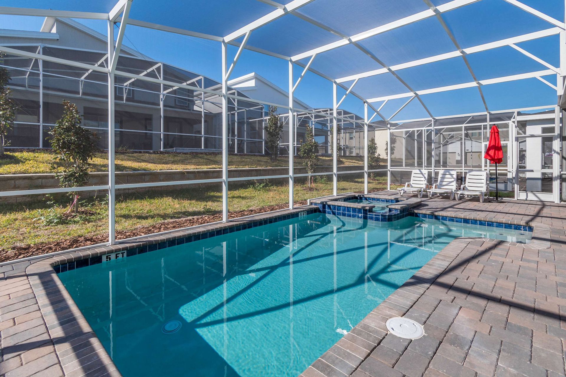 Relax in your private screened pool & spa with sunny seating!