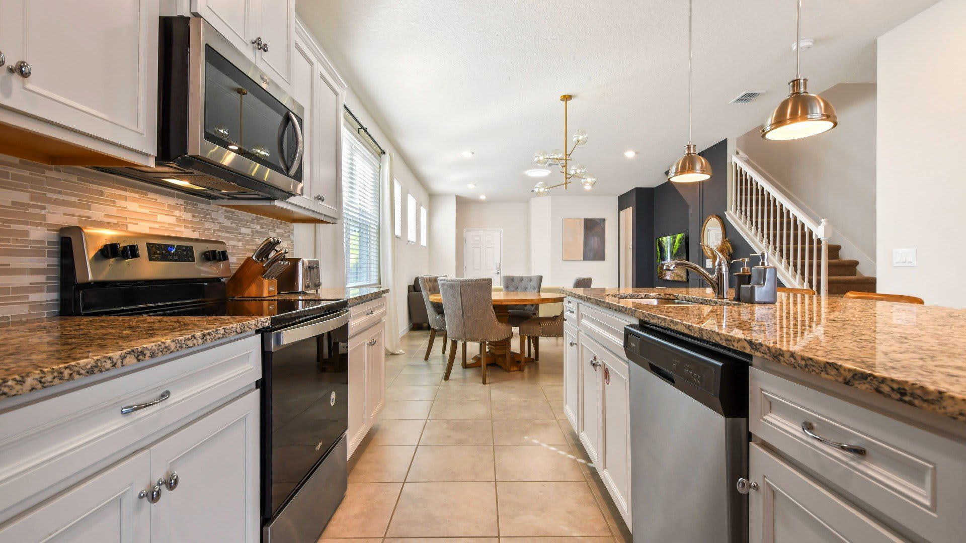 Spacious chef's kitchen, fully equipped with everything needed for culinary endeavors and delightful meals