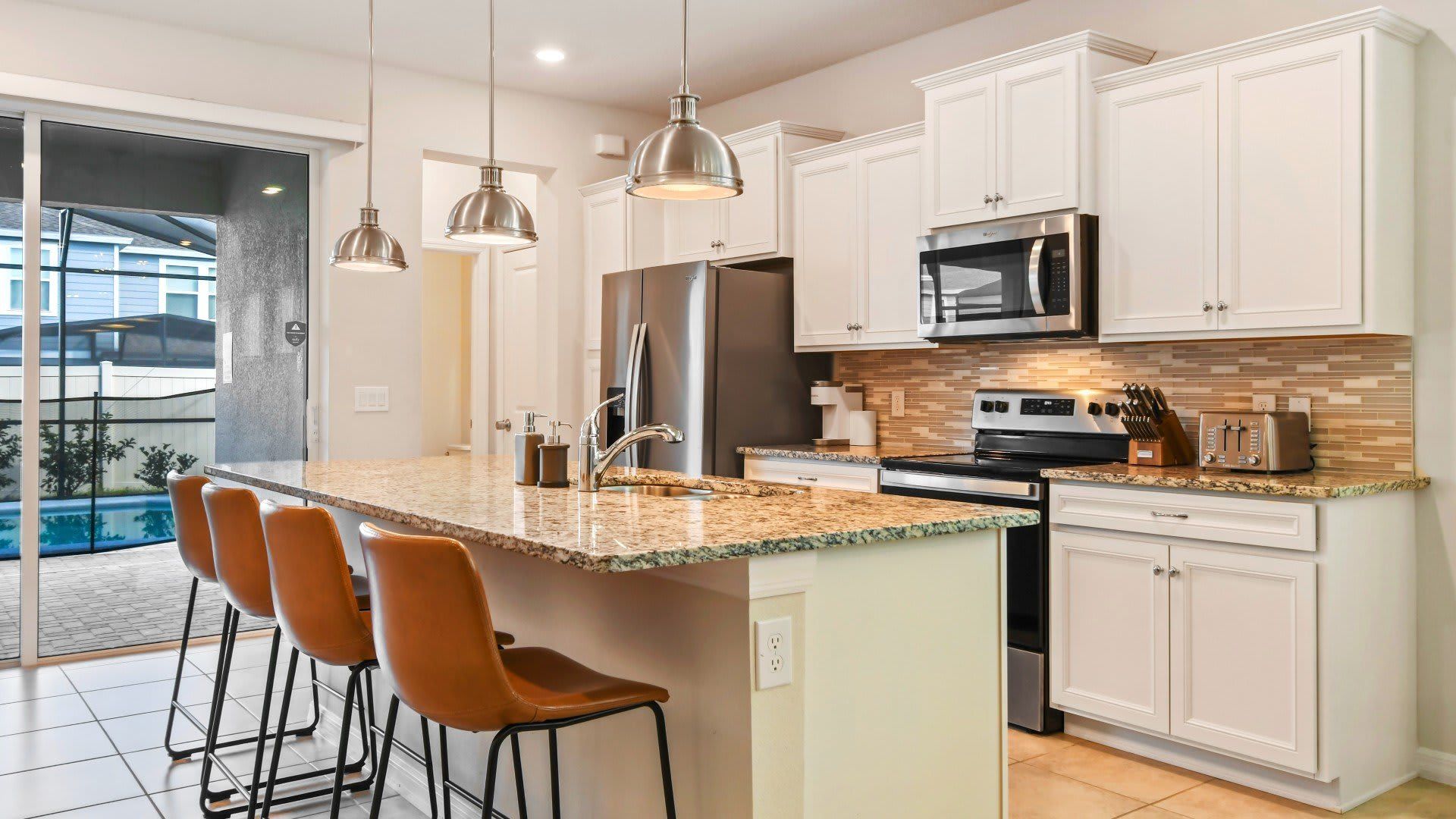 Spacious chef's kitchen, fully equipped with everything needed for culinary endeavors and delightful meals