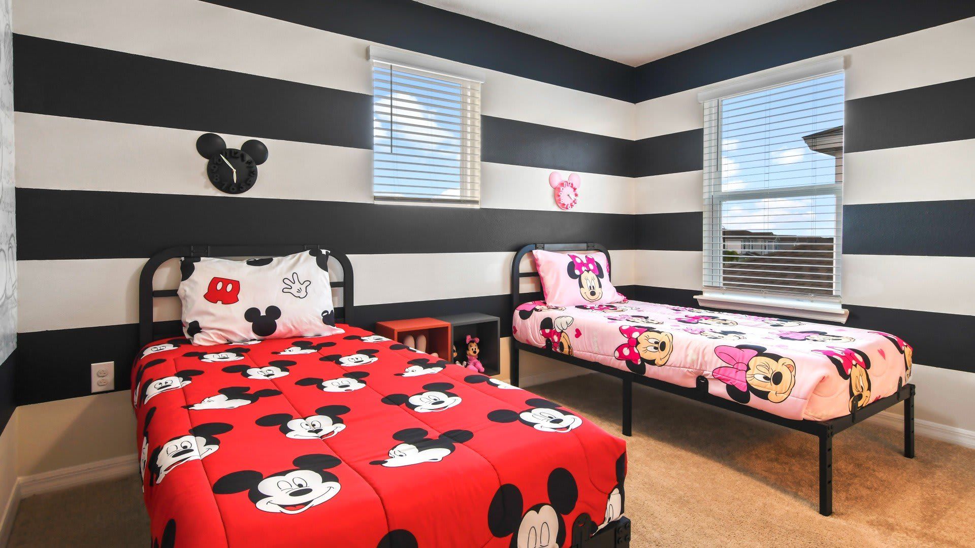 Whimsical Mickey and Minnie Mouse-themed bedroom, ideal for two children, creating a magical and playful space