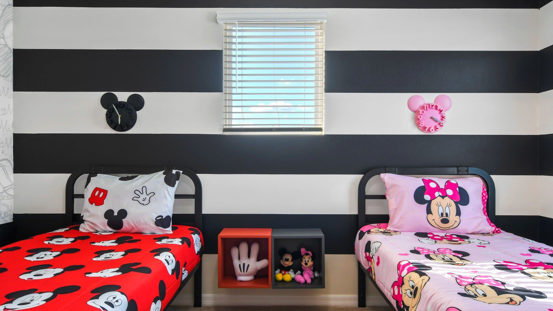 Whimsical Mickey and Minnie Mouse-themed bedroom, ideal for two children, creating a magical and playful space