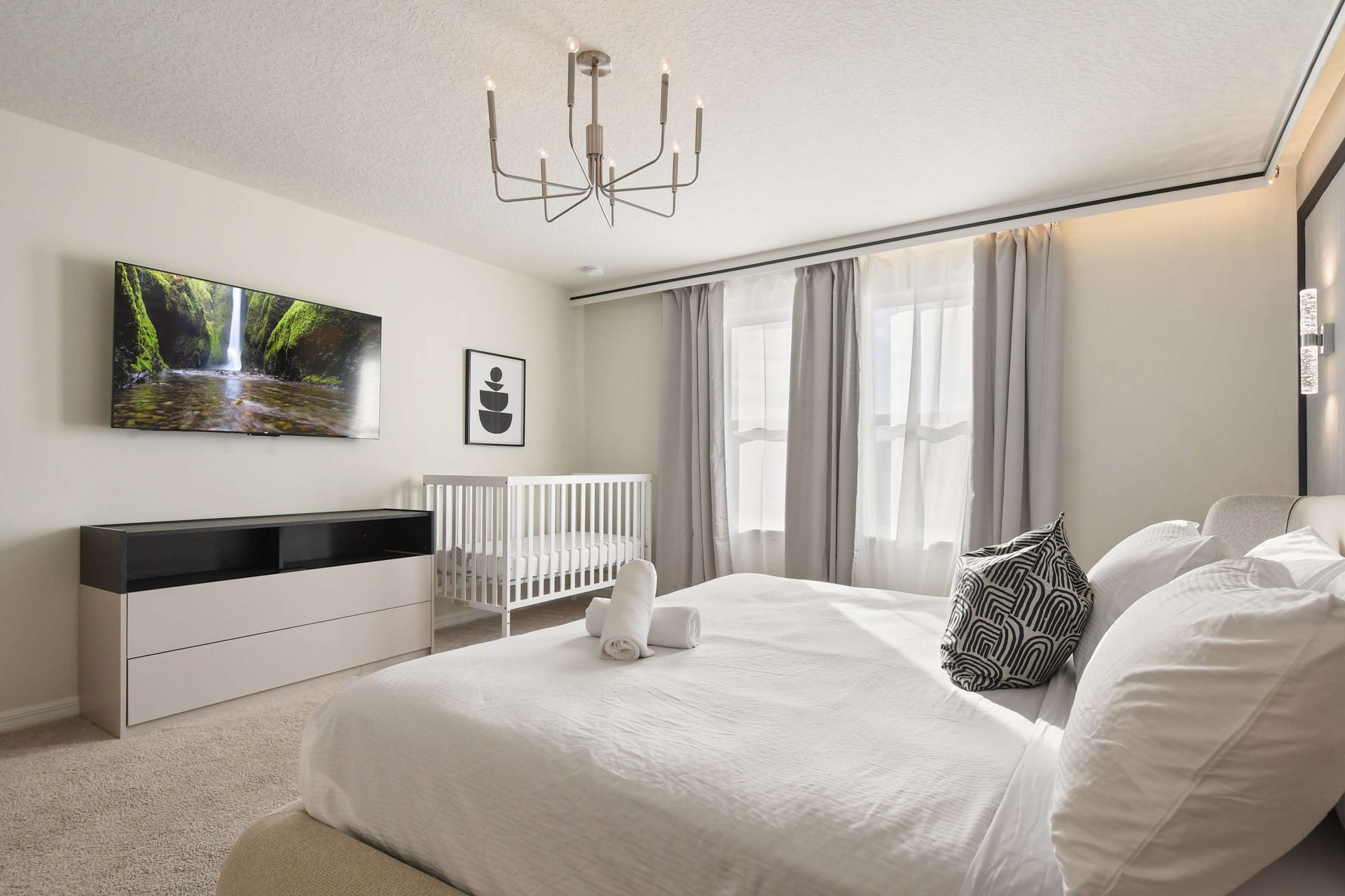 Unwind in our serene bedroom, offering you a tranquil oasis to relax and recharge.