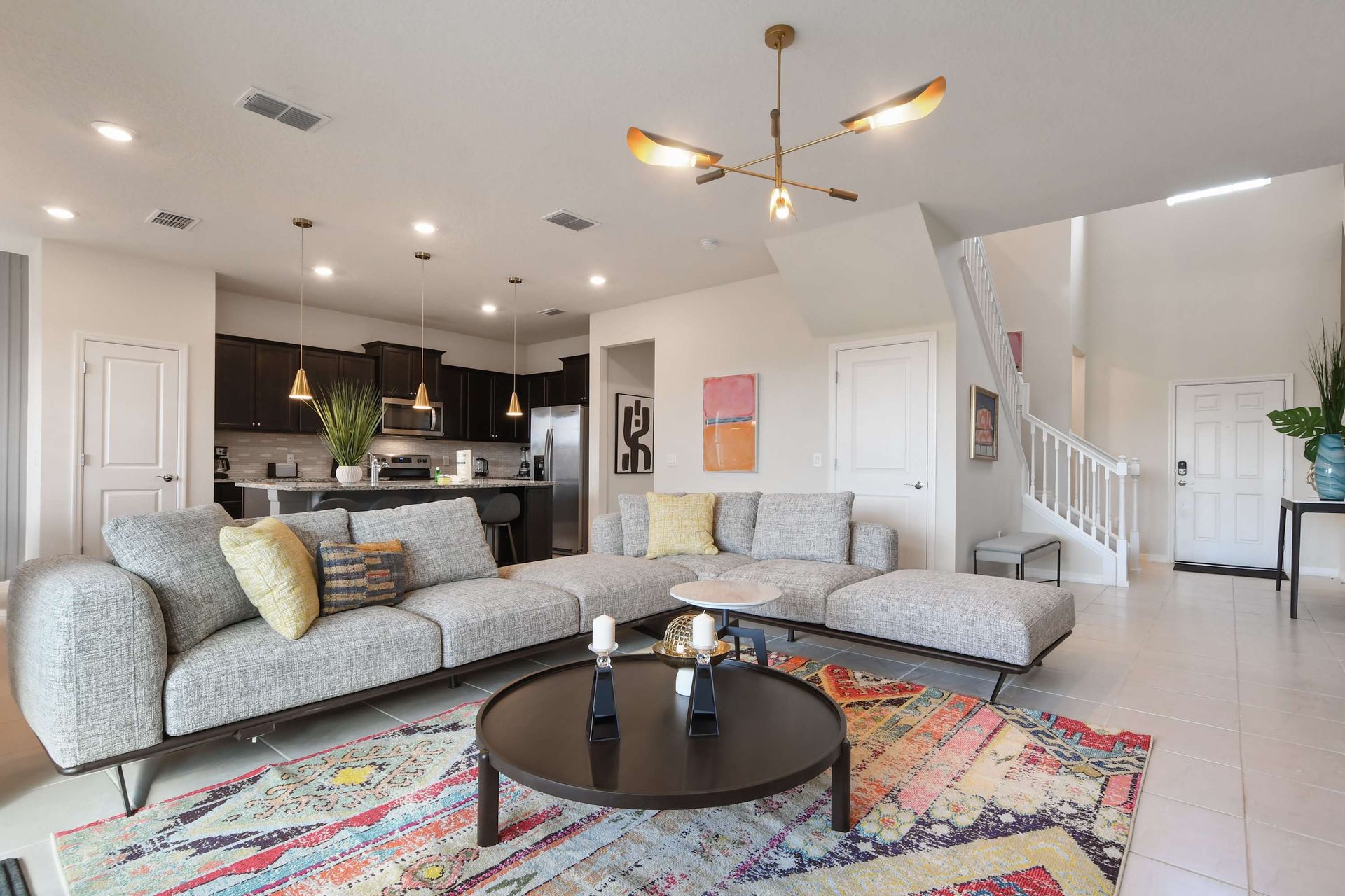 Kick back and relax in our spacious living room, where you can unwind with your favorite book or movie.