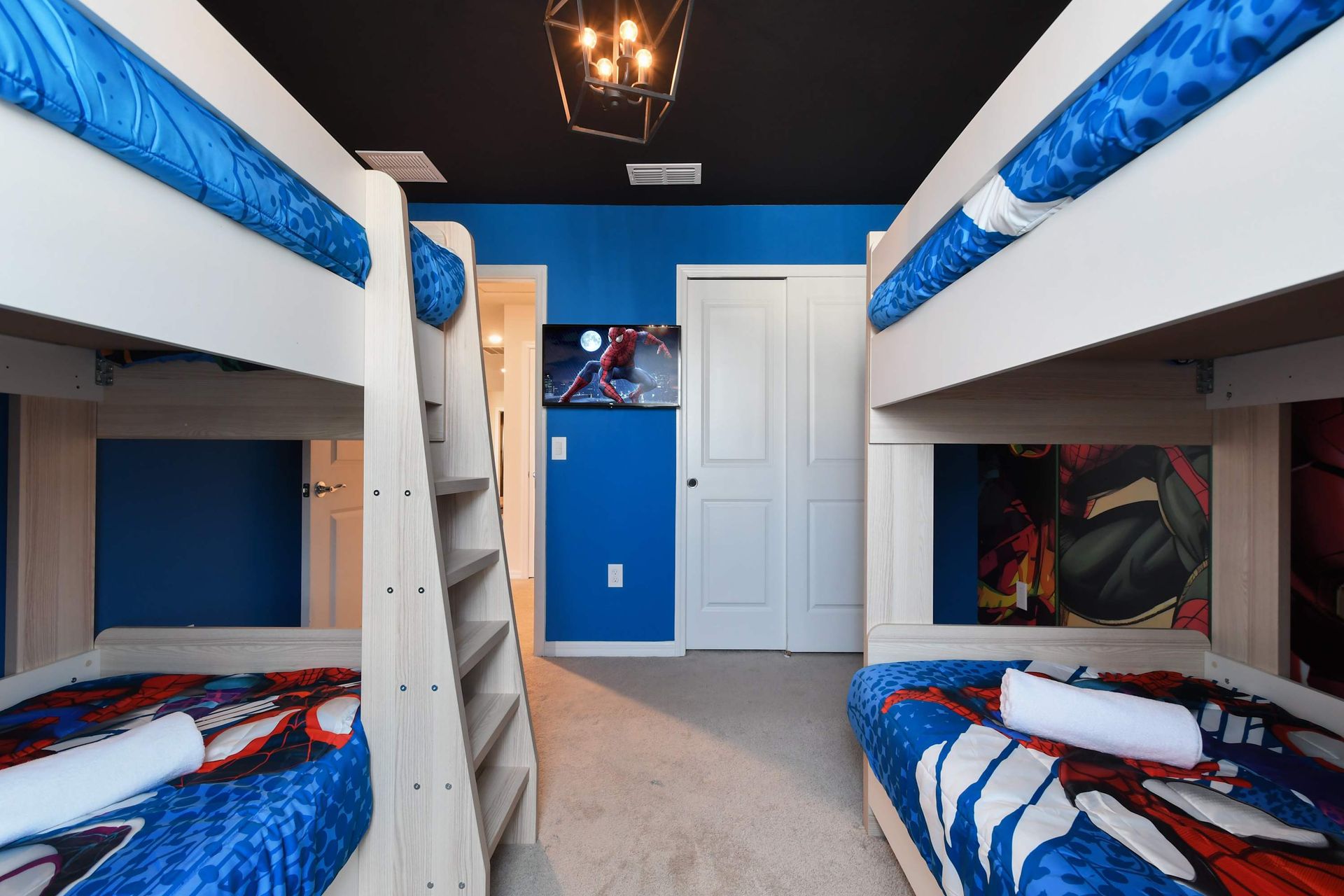 Unwind in our cozy Avengers Inspired room with four beds, providing you with a peaceful retreat and a restful night's sleep during your stay.