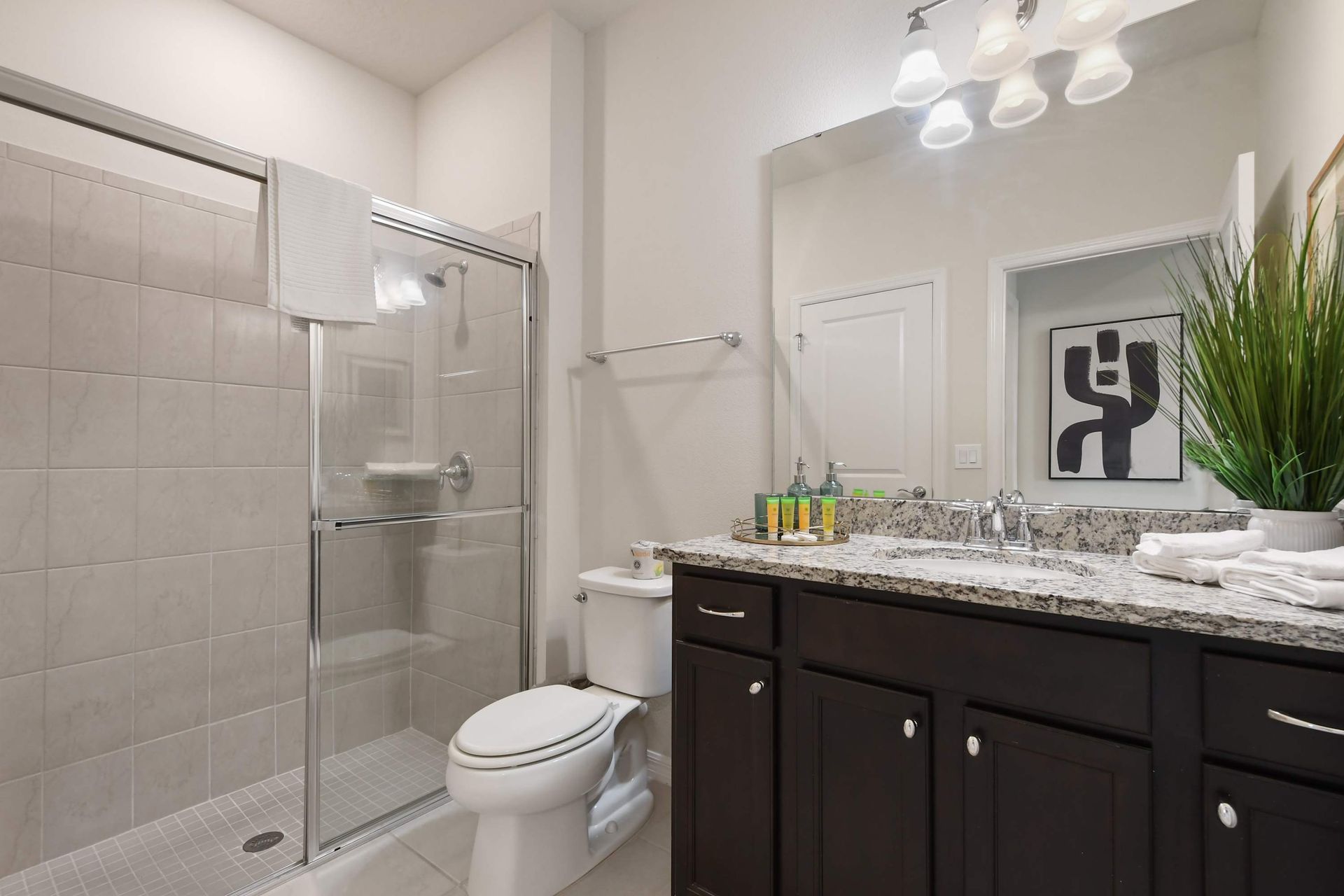Indulge in luxury in our well-appointed bathroom, providing you with all the amenities you need for a comfortable stay.