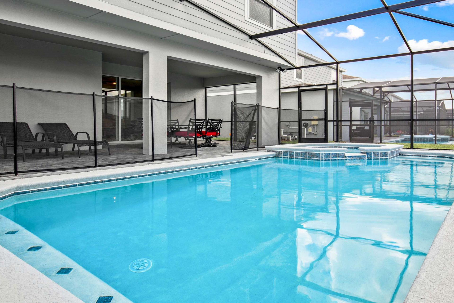 Exclusive enjoyment of screened-in spa and pool for you, friends, and family!.