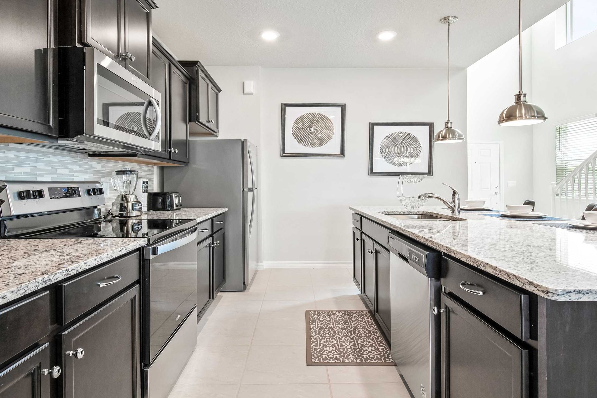 Compact kitchen, featuring a charming mini breakfast bar for cozy morning gatherings