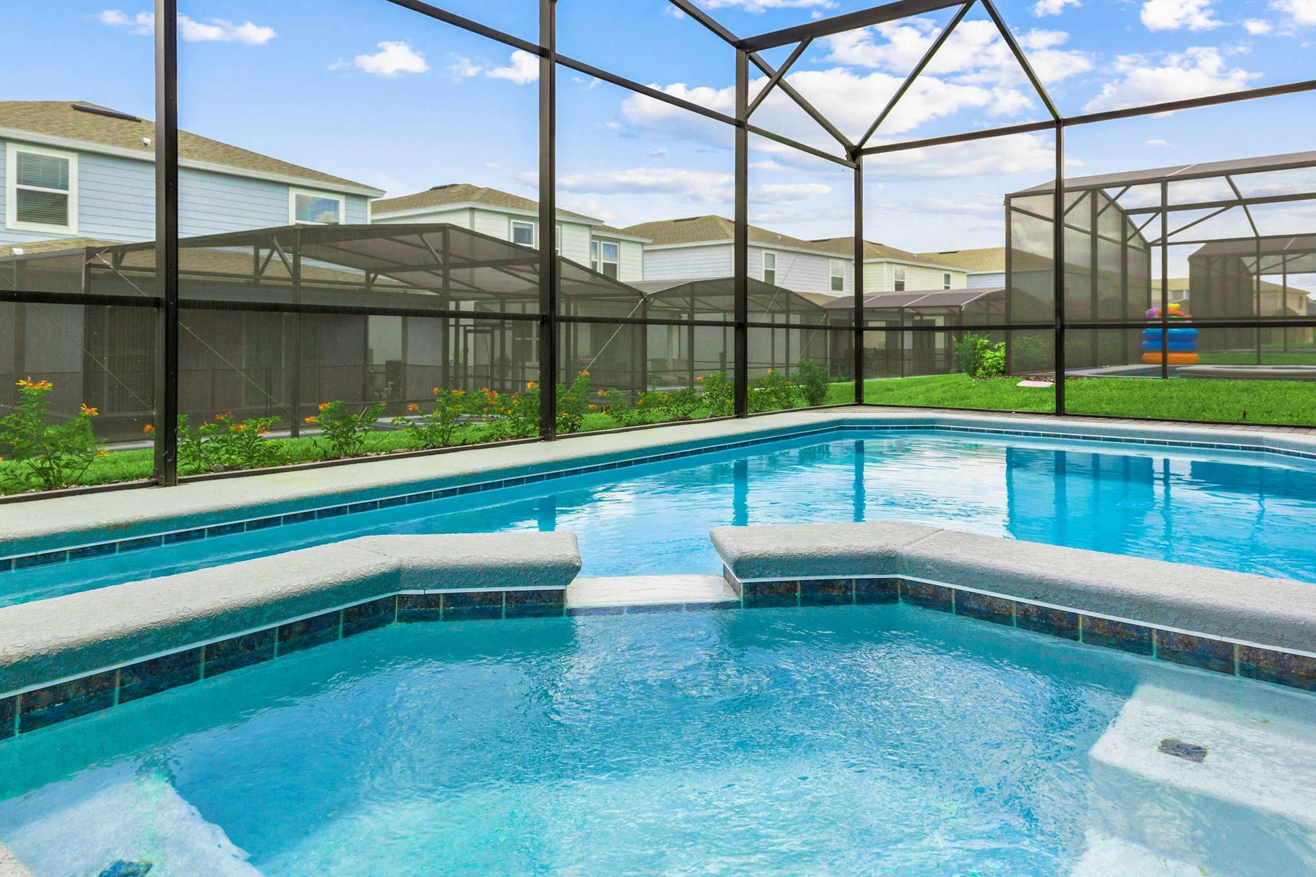 Exclusive enjoyment of screened-in spa and pool for you, friends, and family!.