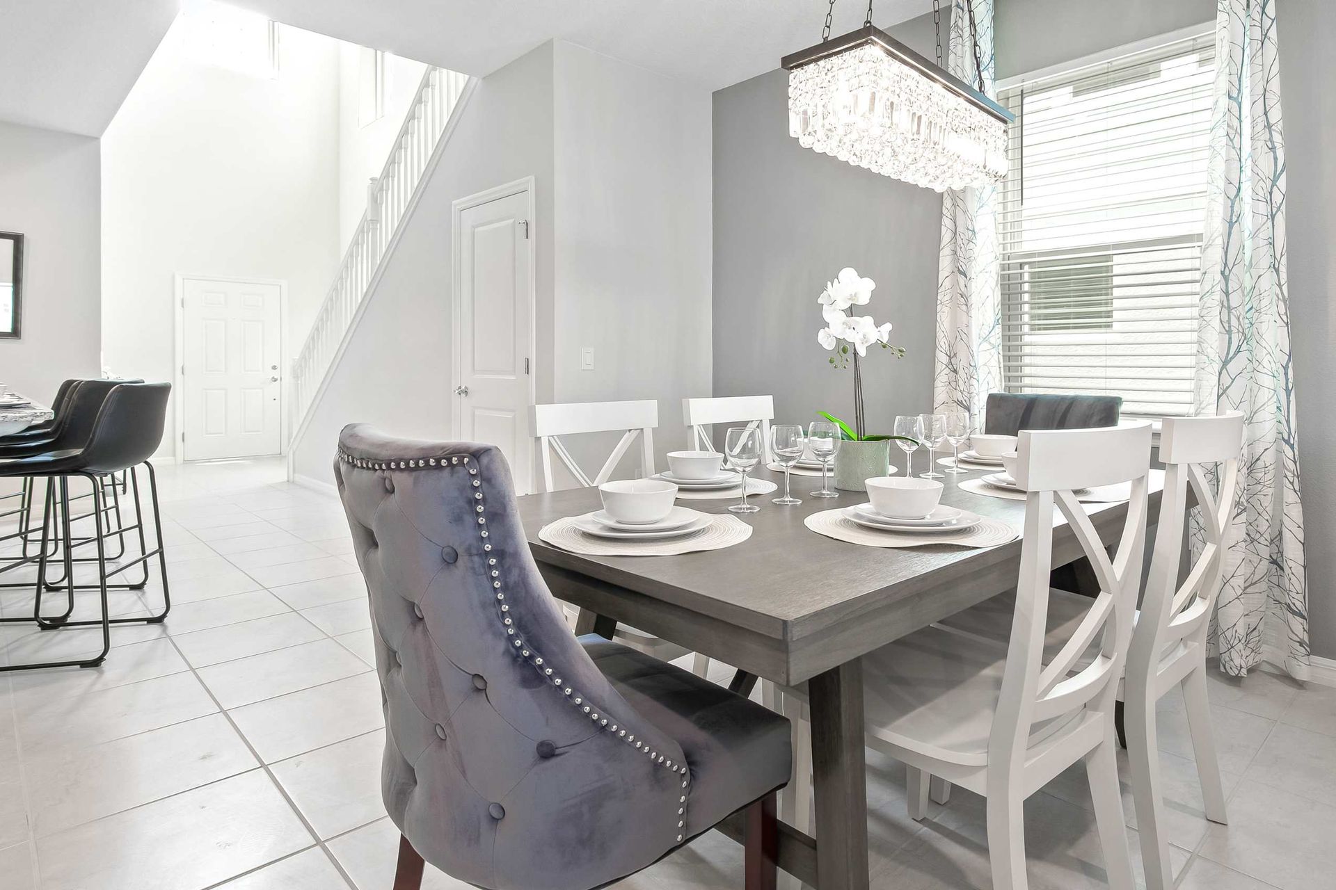 Ample dining space with a large table, perfect for hosting a family feast or gathering