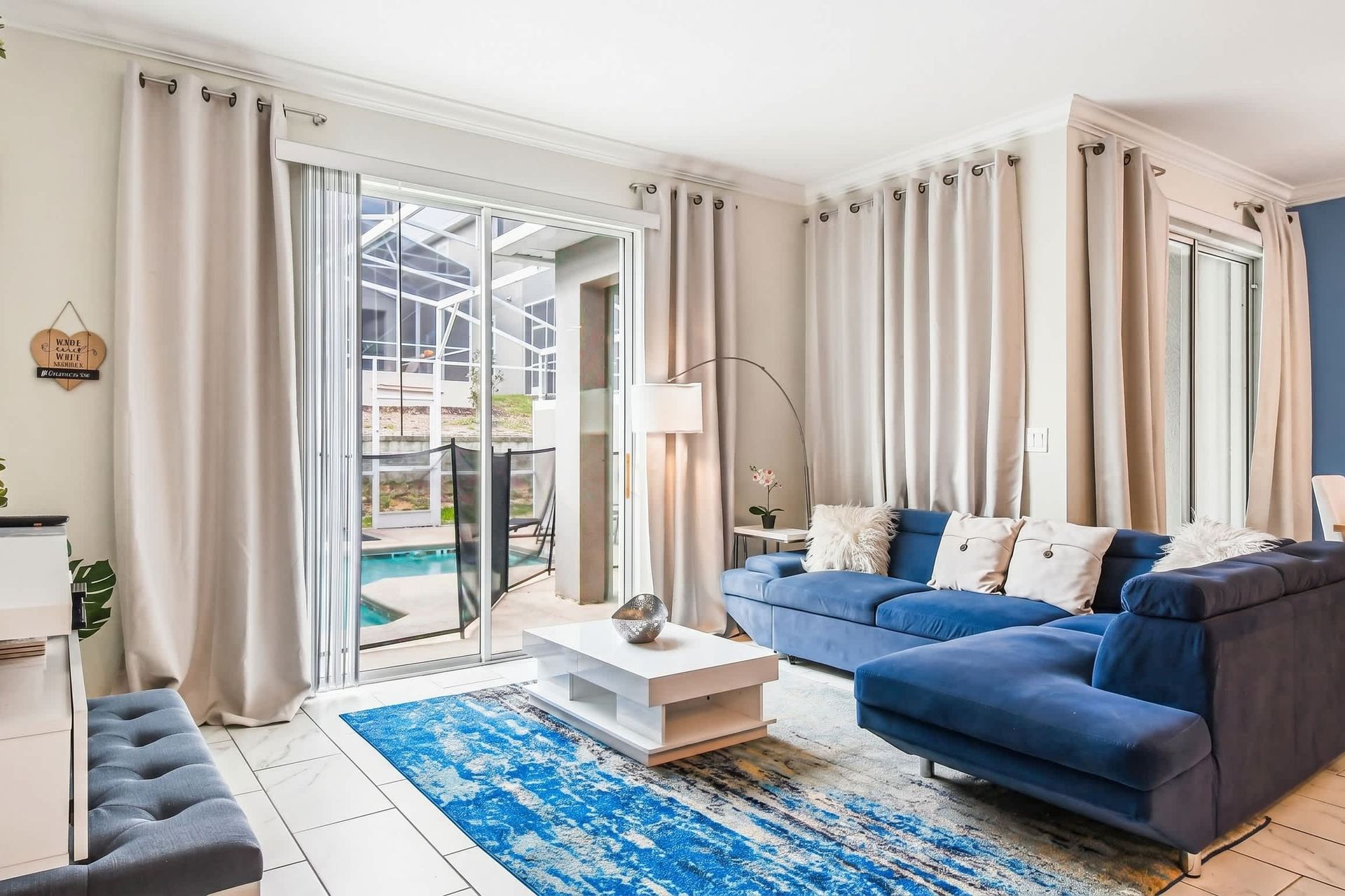 Generous living space, featuring a comfortable sofa, ideal for a family reunion and shared moments.