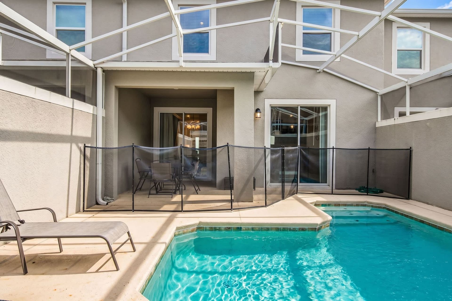 Exclusive enjoyment of screened-in spa and pool for you, friends, and family!.