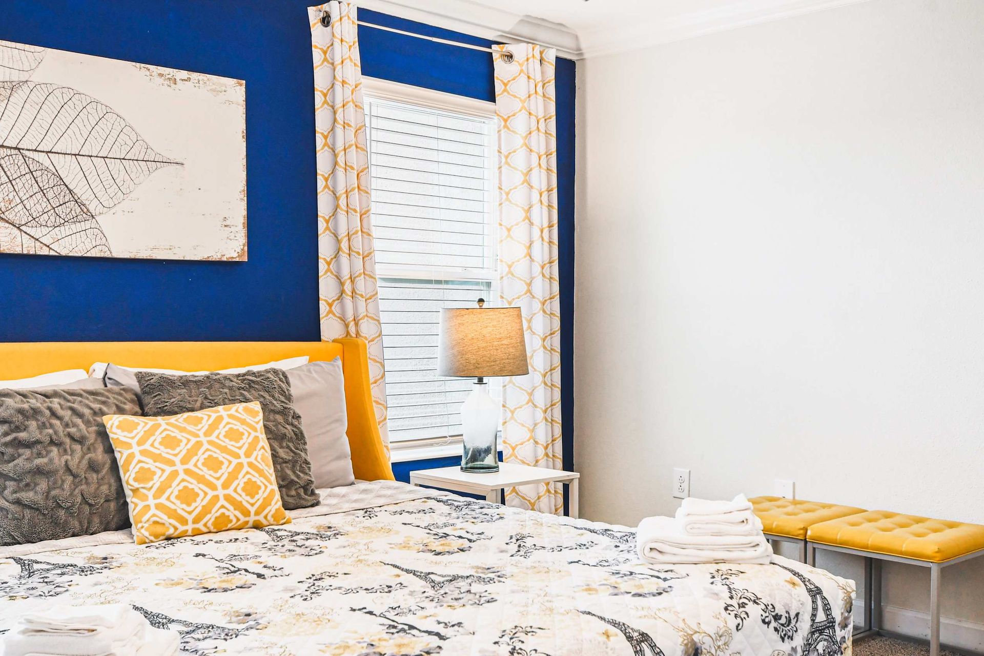 Sleek and pristine king bedroom exuding cleanliness and sophisticated simplicity