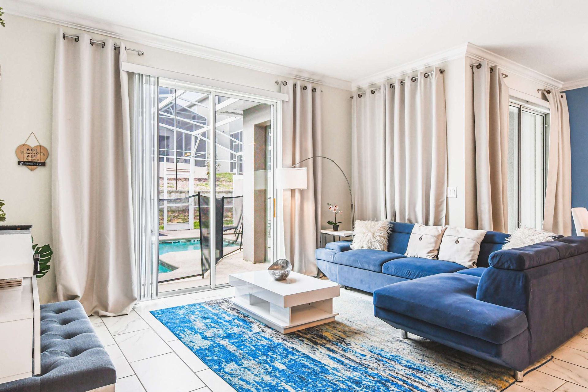 Generous living space, featuring a comfortable sofa, ideal for a family reunion and shared moments.