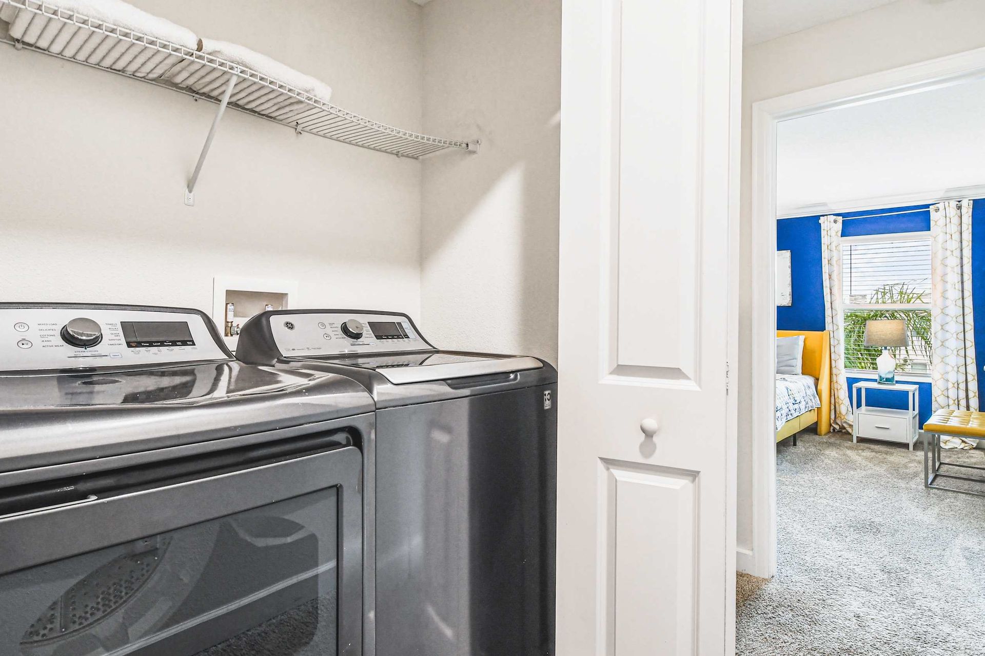 Efficient laundry space equipped with washer and dryer for convenient and organized household chores