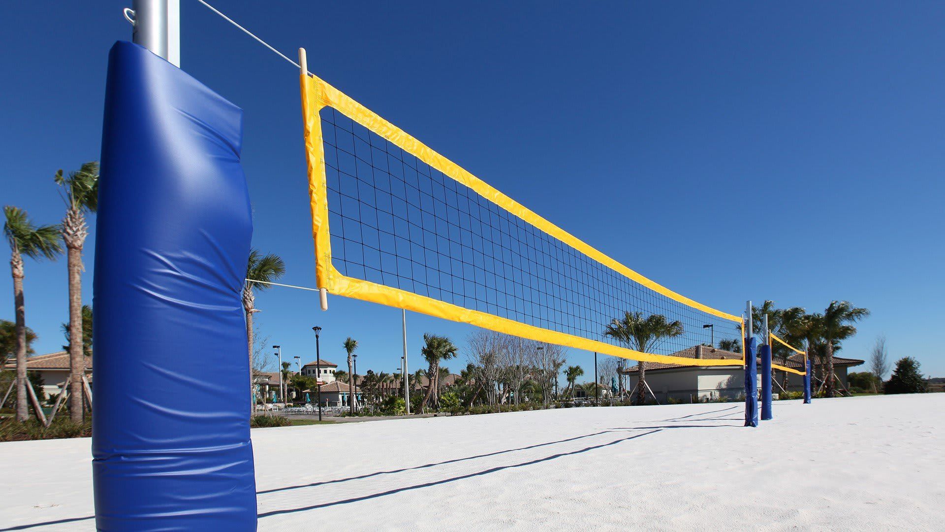 Resort Amenities - Resort volleyball court with sandy setting, offering a beachy atmosphere for spirited games