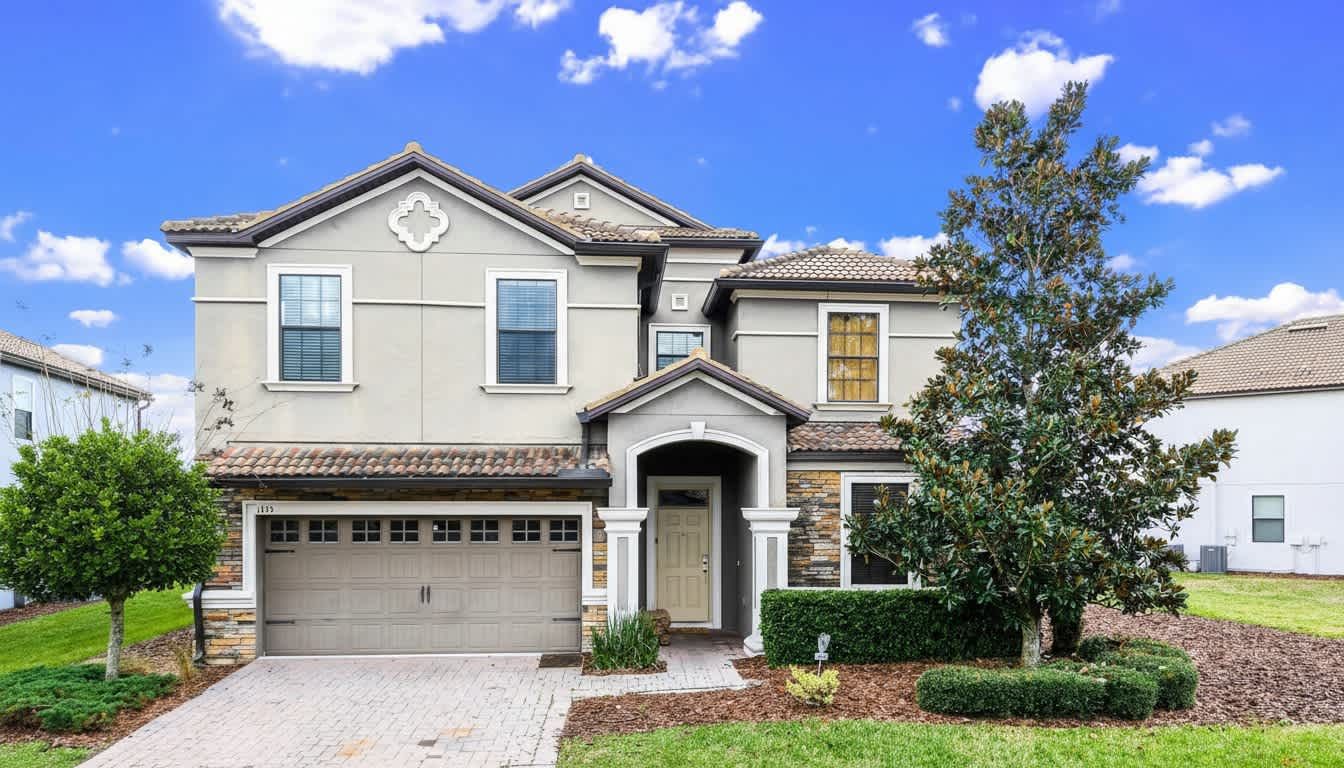 Stunning home, surrounded by lush greenery and featuring a convenient garage for a perfect blend of beauty and functionality