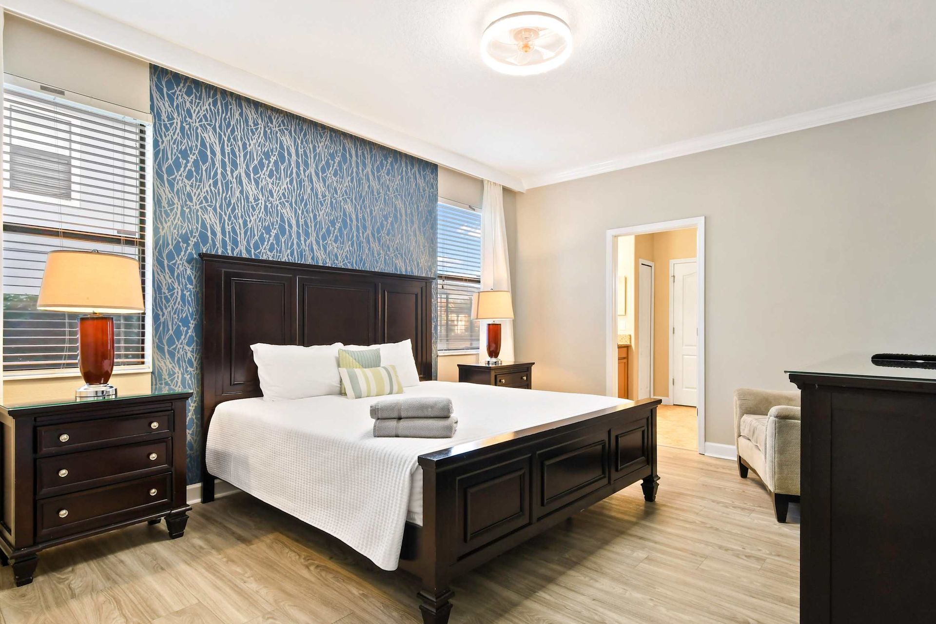 Sleek and pristine king bedroom exuding cleanliness and sophisticated simplicity