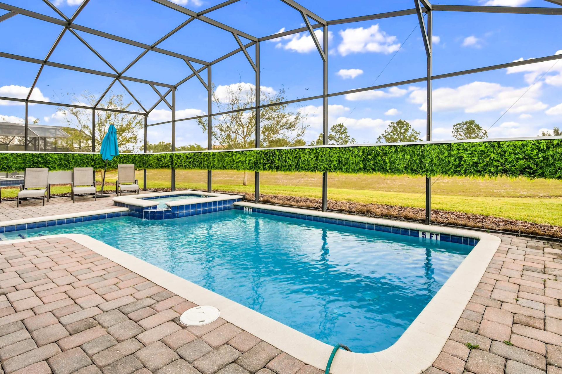 Screened outdoor pool, blending the joys of swimming with a sheltered and private oasis