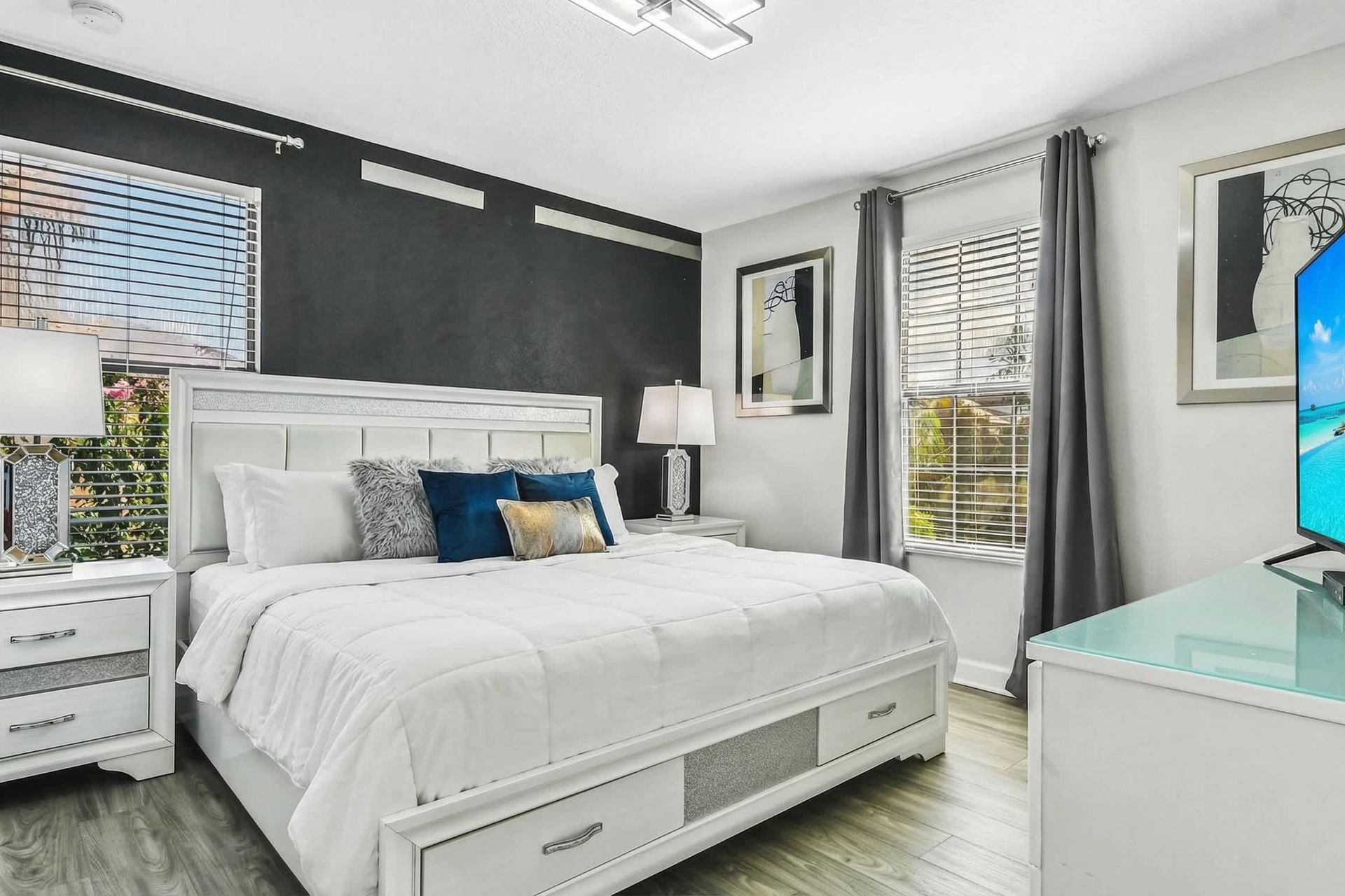 Comfortable king bed in a spacious bedroom, ensuring restful nights and a luxurious atmosphere