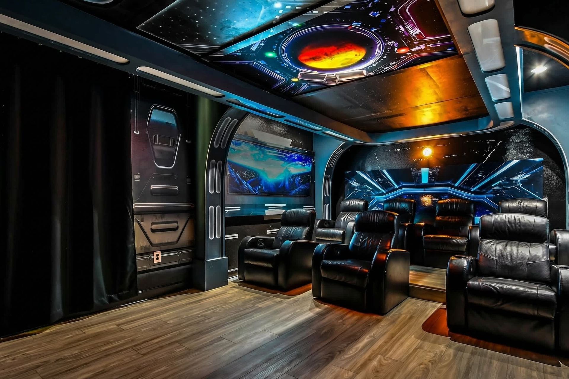 Futuristic home theater with plush seating, space-themed decor, and a cosmic ceiling mural.