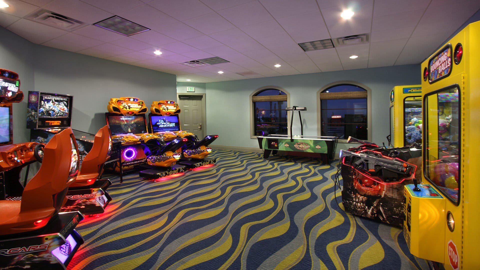 Resort Amenities -Entertaining resort arcade, featuring a variety of games for guests to enjoy playful moments