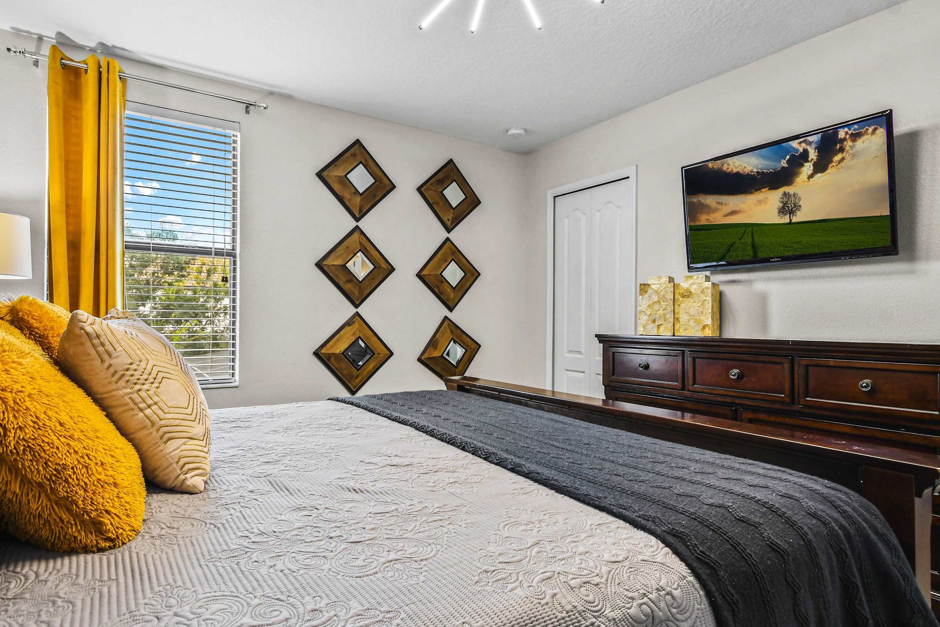 Comfortable king bed in a spacious bedroom, ensuring restful nights and a luxurious atmosphere