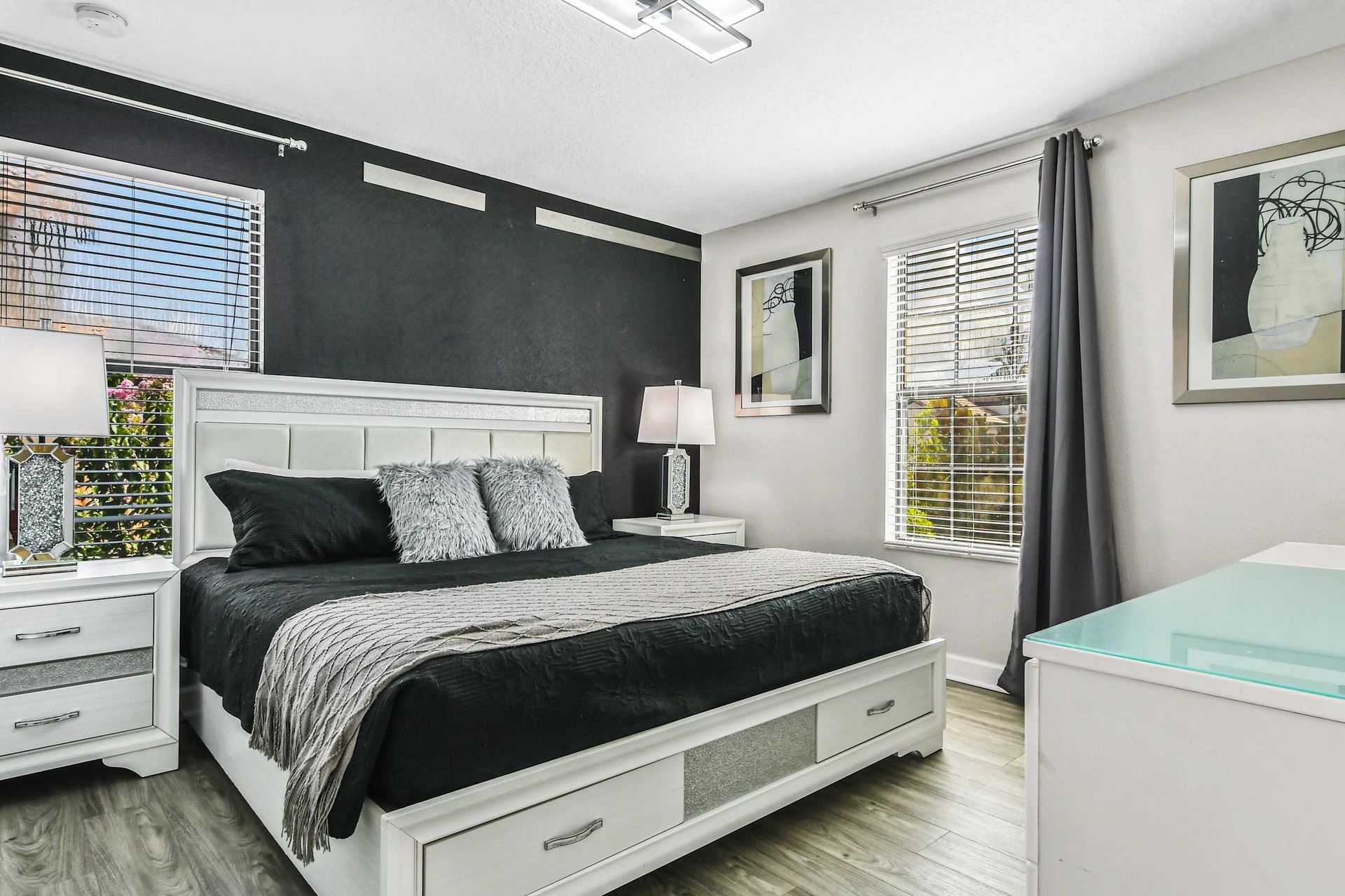 Comfortable king bed in a spacious bedroom, ensuring restful nights and a luxurious atmosphere