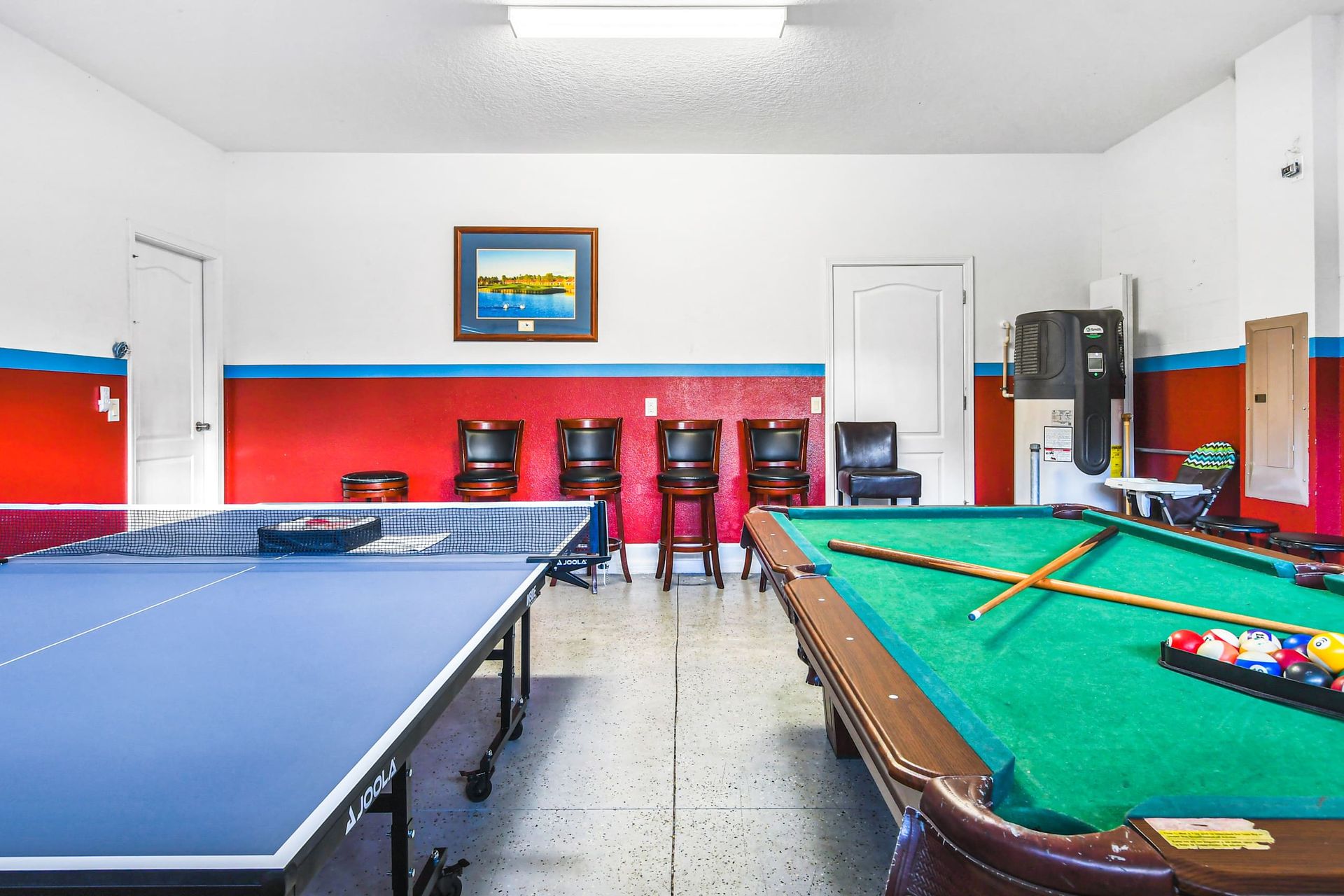 Entertainment hub featuring a pool table and table tennis setup for lively recreation