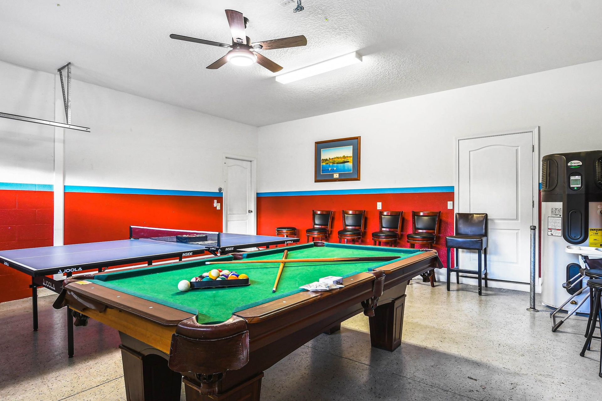 Entertainment hub featuring a pool table and table tennis setup for lively recreation