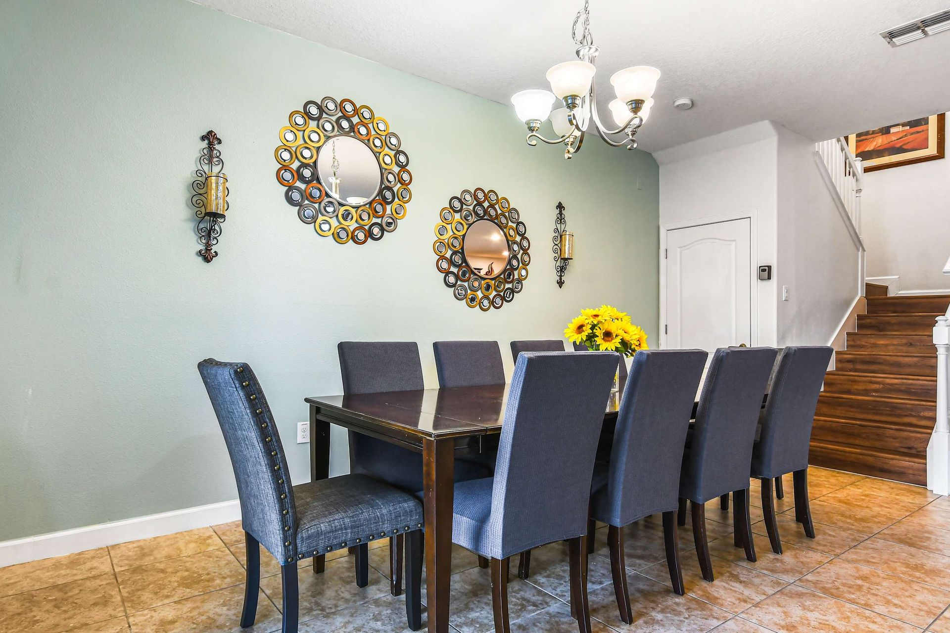 A stylish dining area with a dark wood table