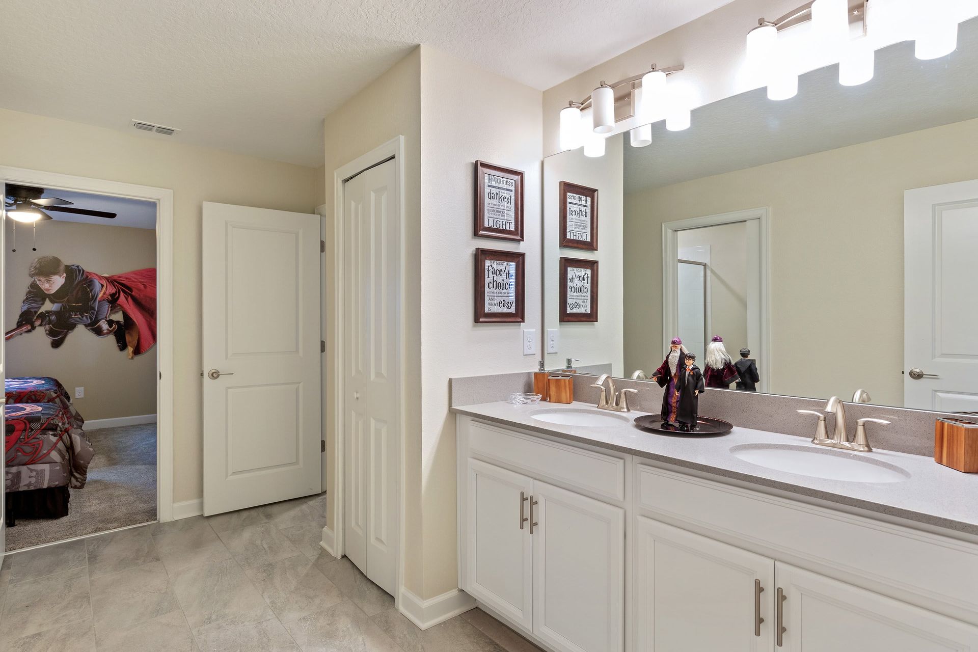 Wizarding World-themed bathroom with double vanity and magical decor!