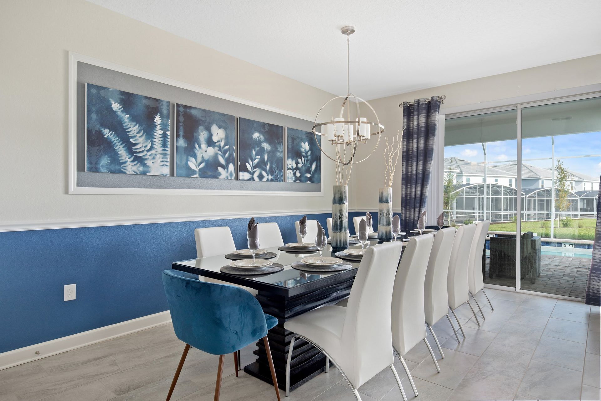 Elegant dining space with seating for 10, modern decor, and pool view!
