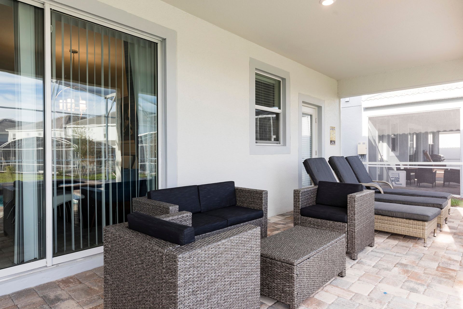 Relaxing patio with comfy lounge chairs and outdoor seating area!