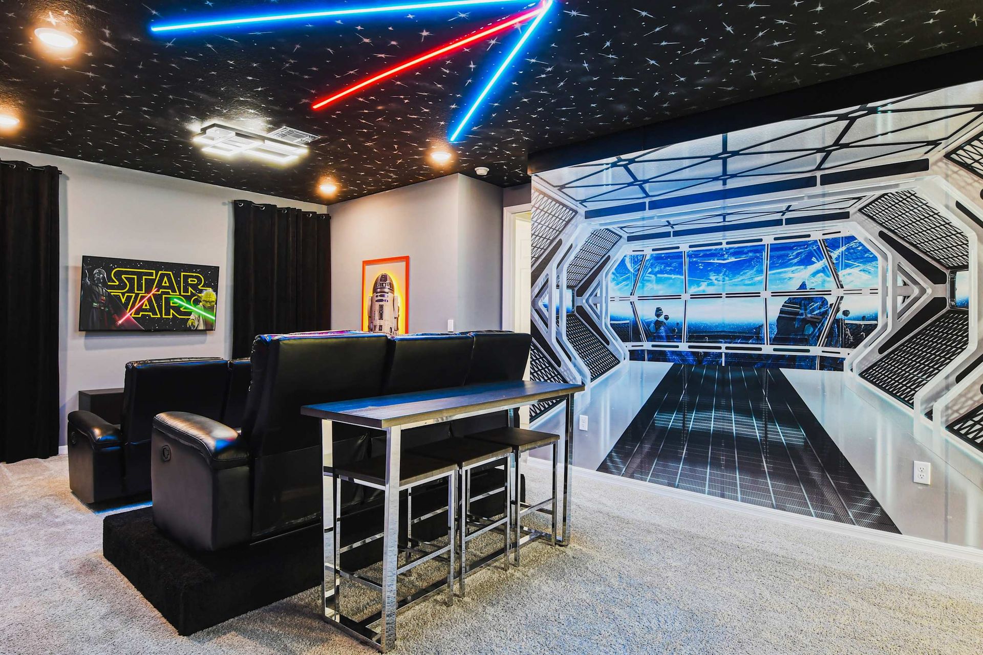 Epic sci-fi home theater with starry ceiling, themed walls, and cozy seating.
