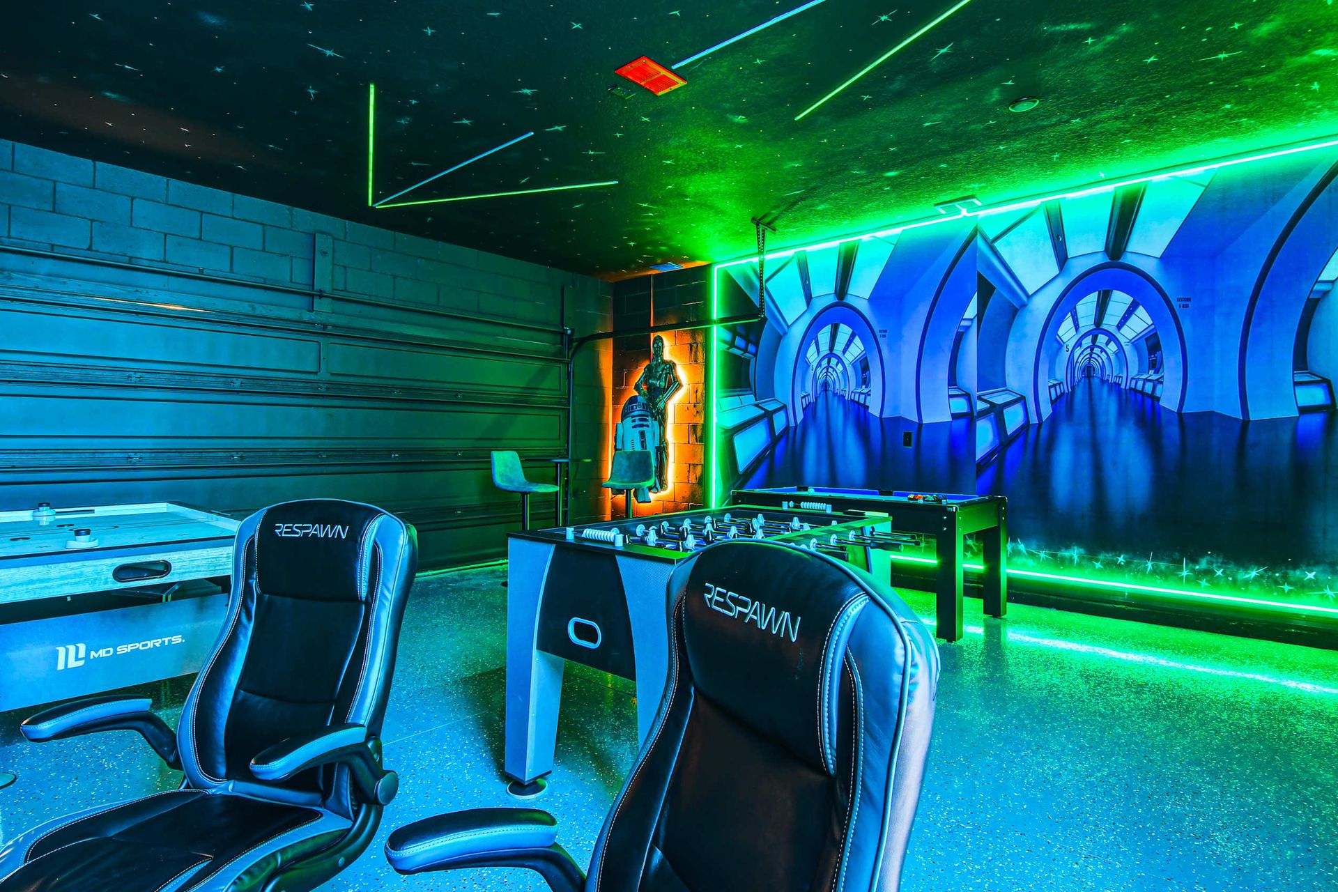 Experience Star Wars excitement in a game room equipped with a pool table and foosball for ultimate entertainment