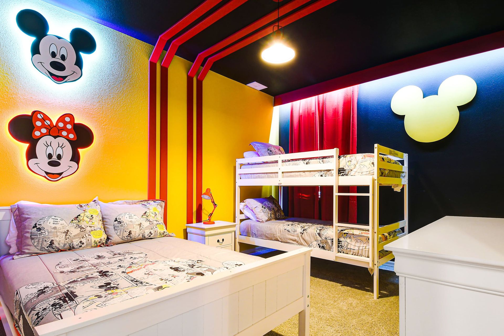 Mickey Mouse-inspired charm, featuring a full bed and bunk bed for a whimsical and cozy stay