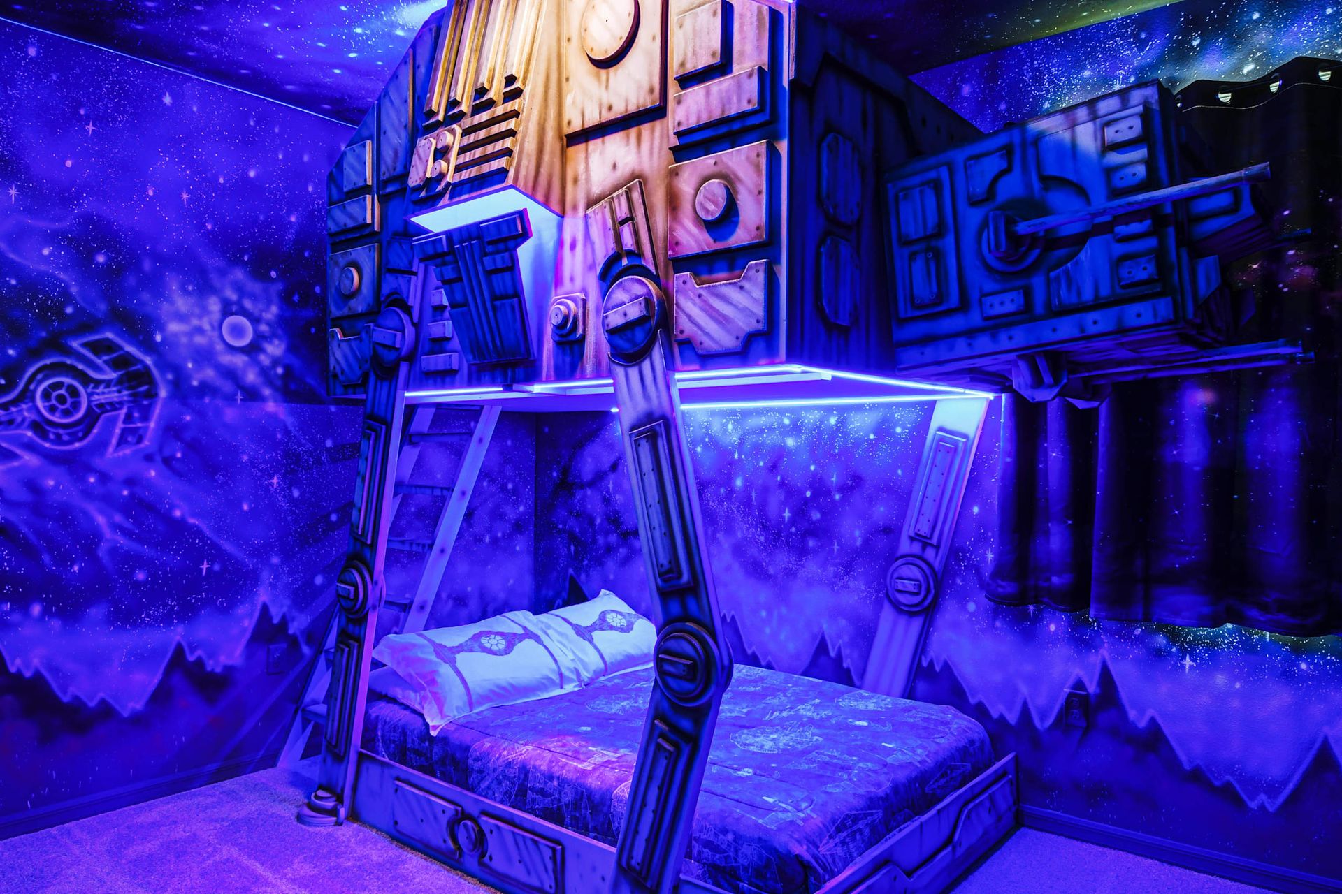 Epic Star Wars-themed room with AT-AT bunk bed, galactic murals, and glowing LED lighting.