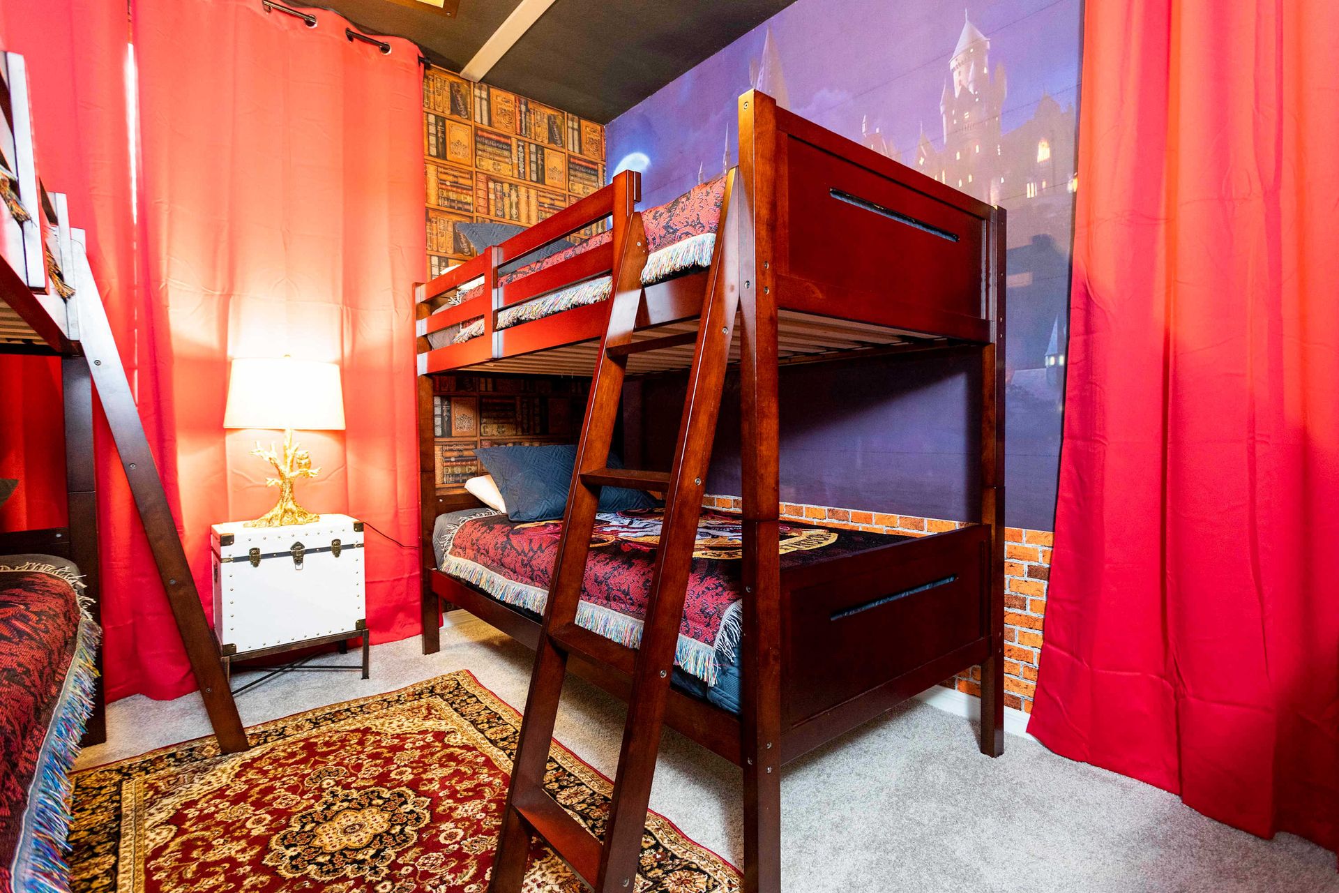 Themed bunk bed room with cozy decor, rich colors, and magical ambiance.