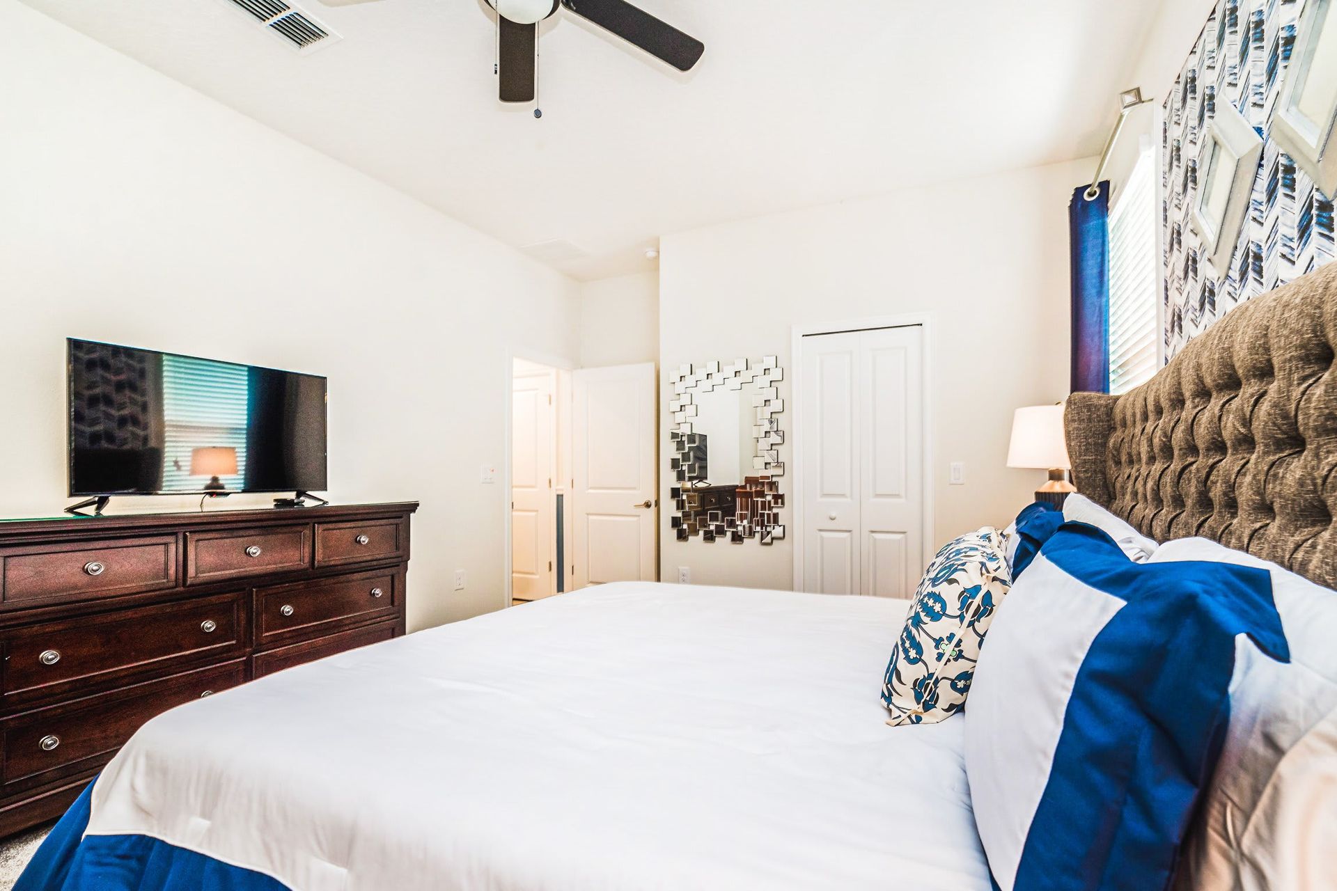 Cozy retreat featuring a plush king-sized bed and a TV for a perfect blend of comfort and entertainment