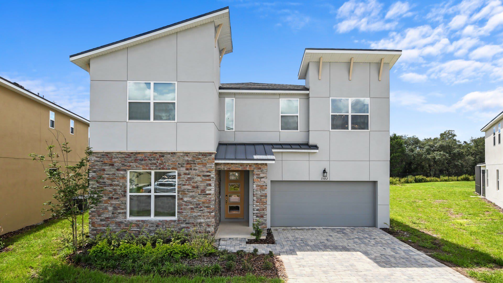 Sleek and contemporary, the house exterior showcases a stylish and cutting-edge design